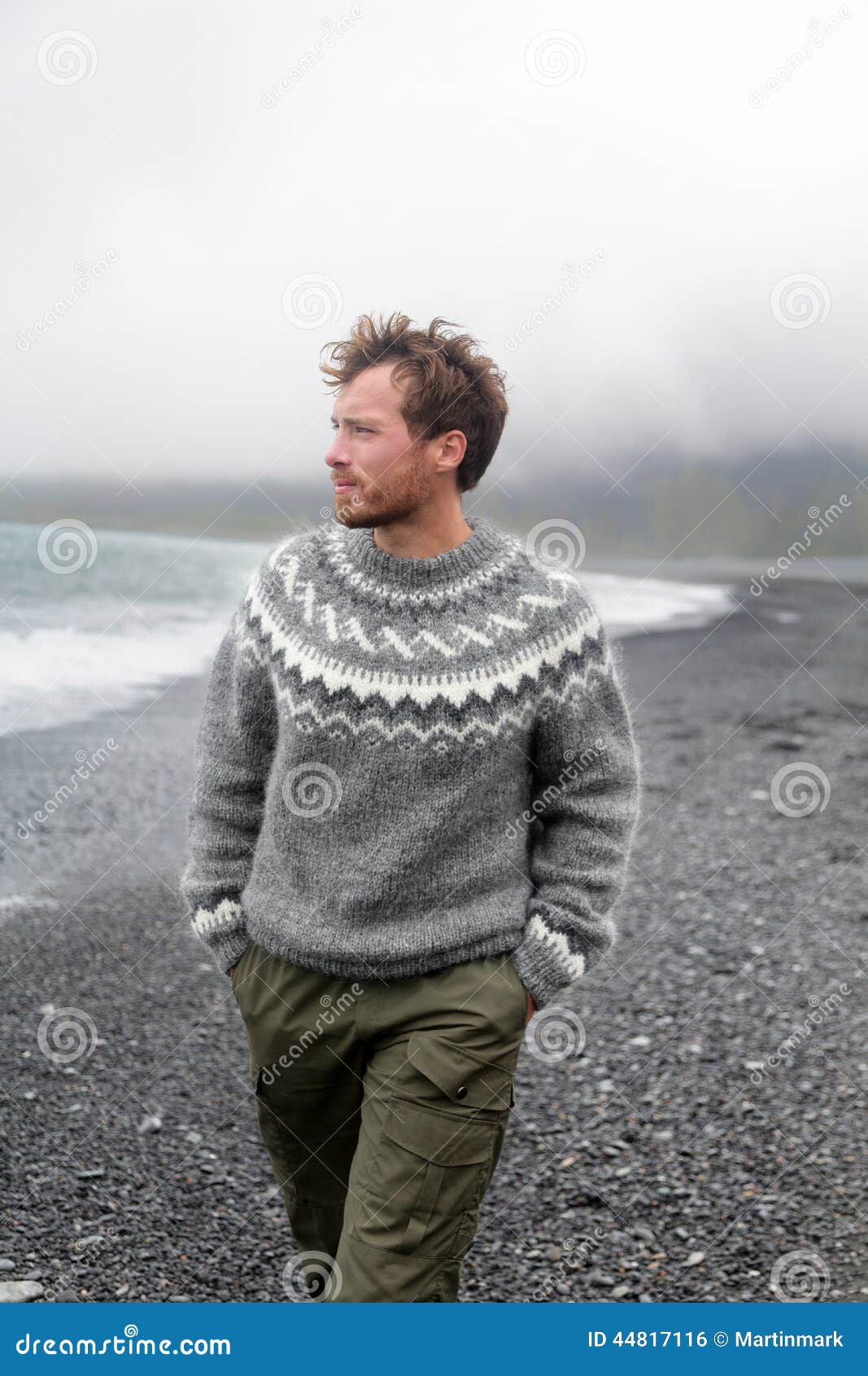 Man Walking on Black Sand Beach on Iceland Stock Photo - Image of ocean ...