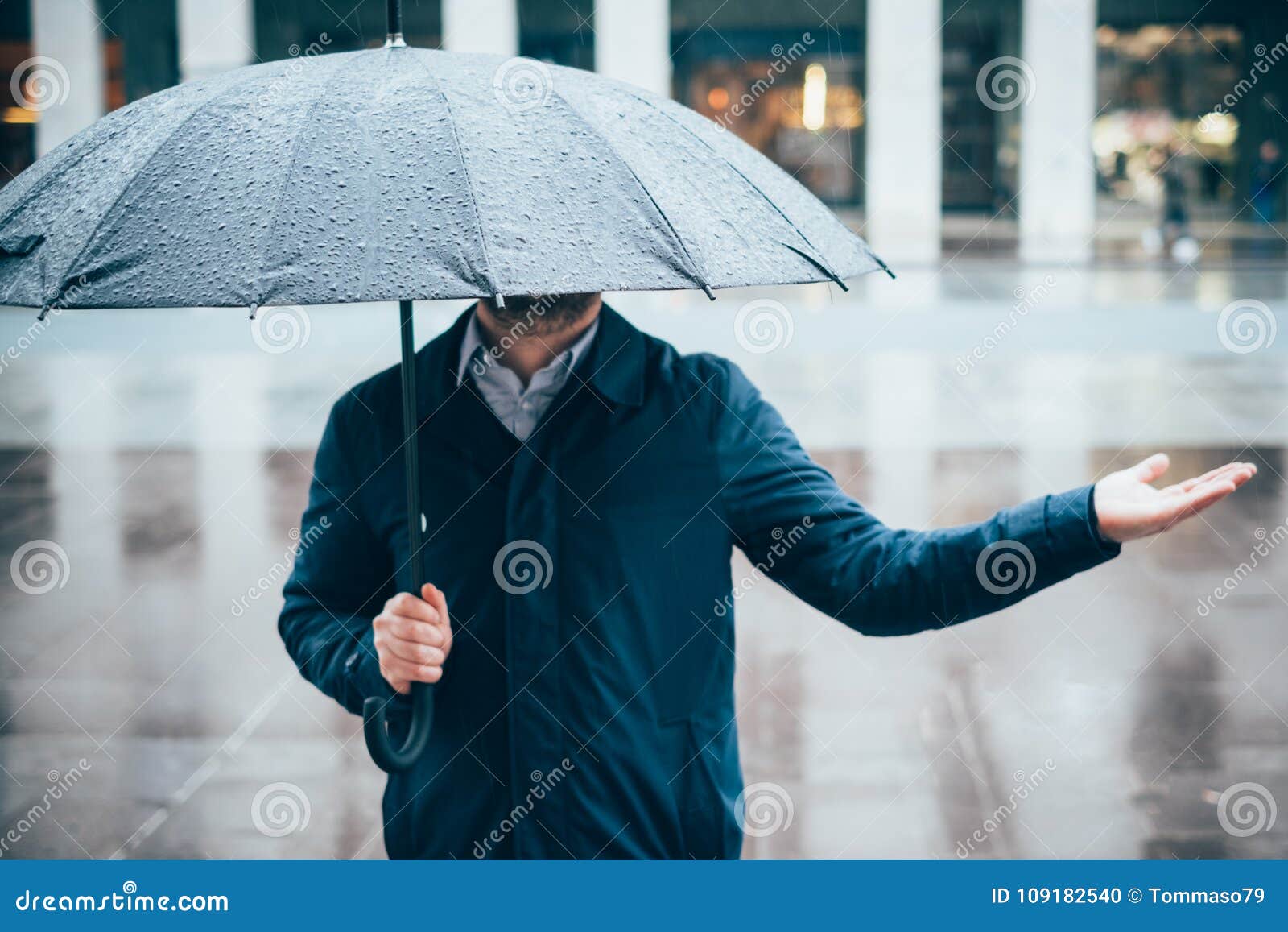 Man Walking in the City with Umbrella on Rainy Day Stock Photo ...