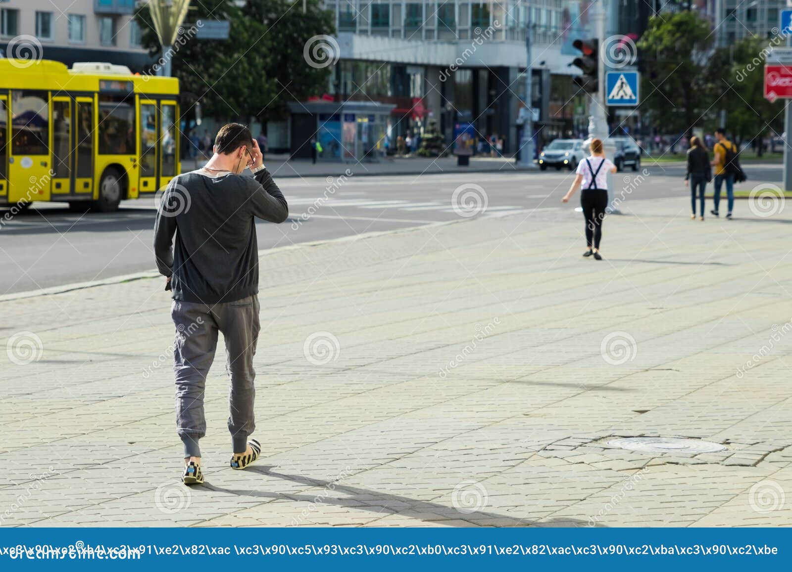 The Man is Walking Down the Street Editorial Stock Photo Image of