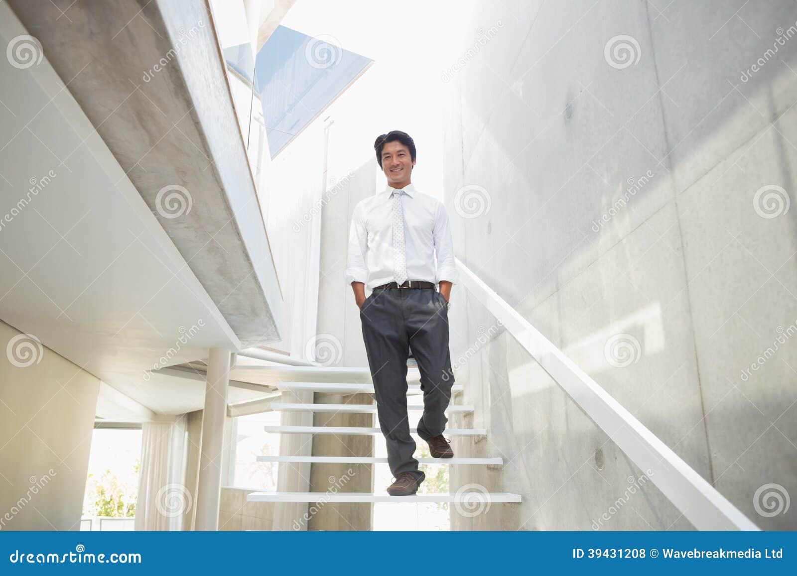 Man Walking with Hands in Pockets Stock Photo Image of household