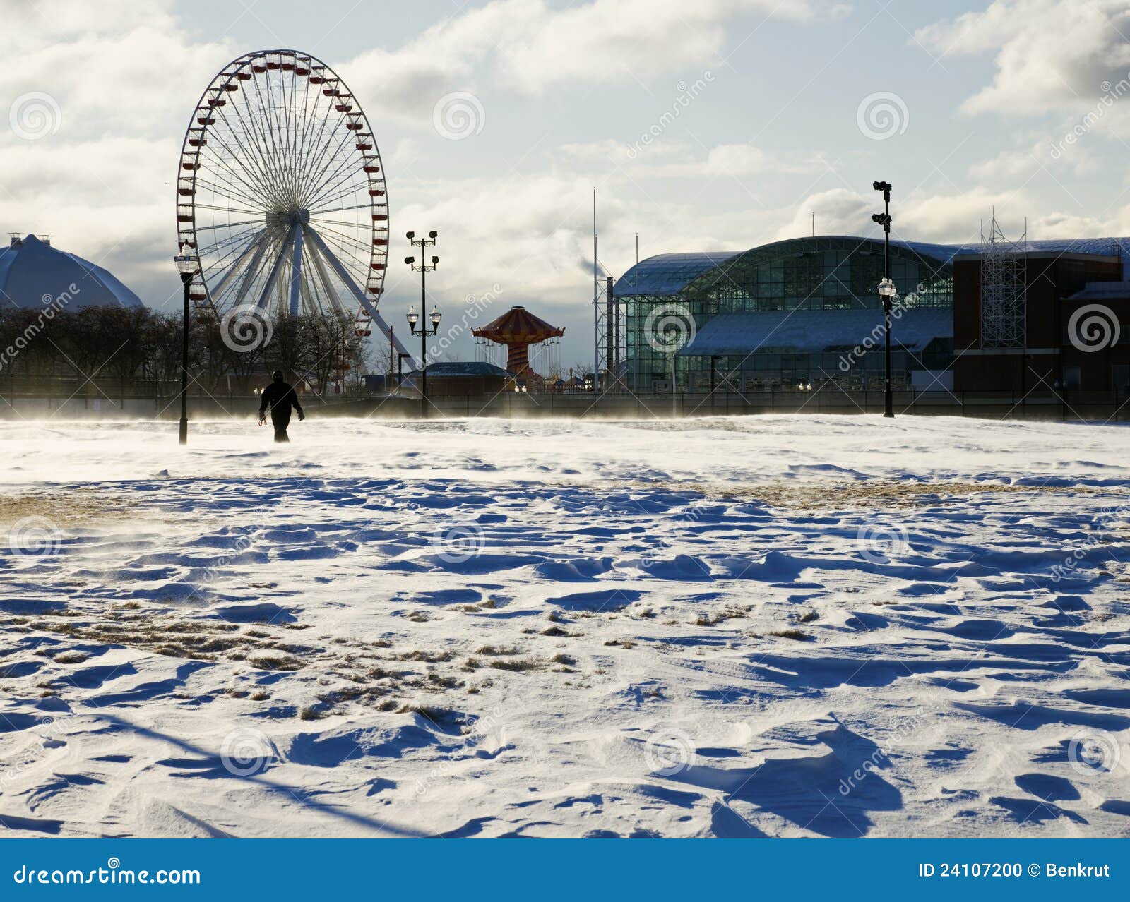 Man walking in Olive Park during harsh winter morning.