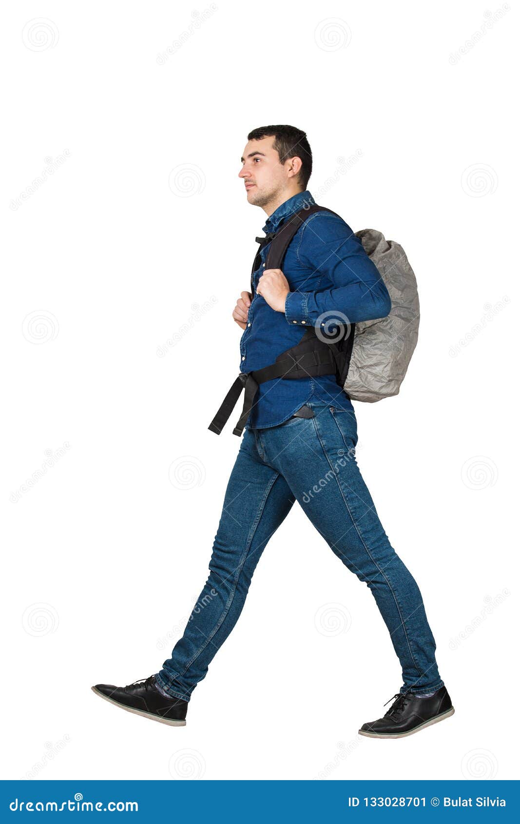 man carrying backpack