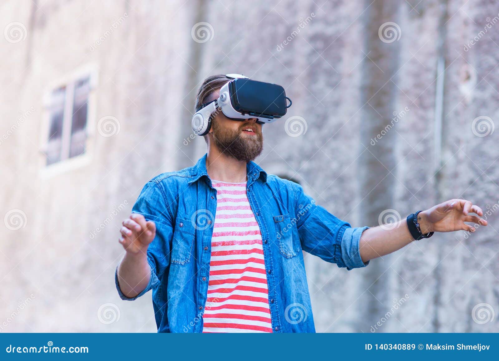 Man Walking in the Street in Augmented Reality Headset. Virtual Reality ...