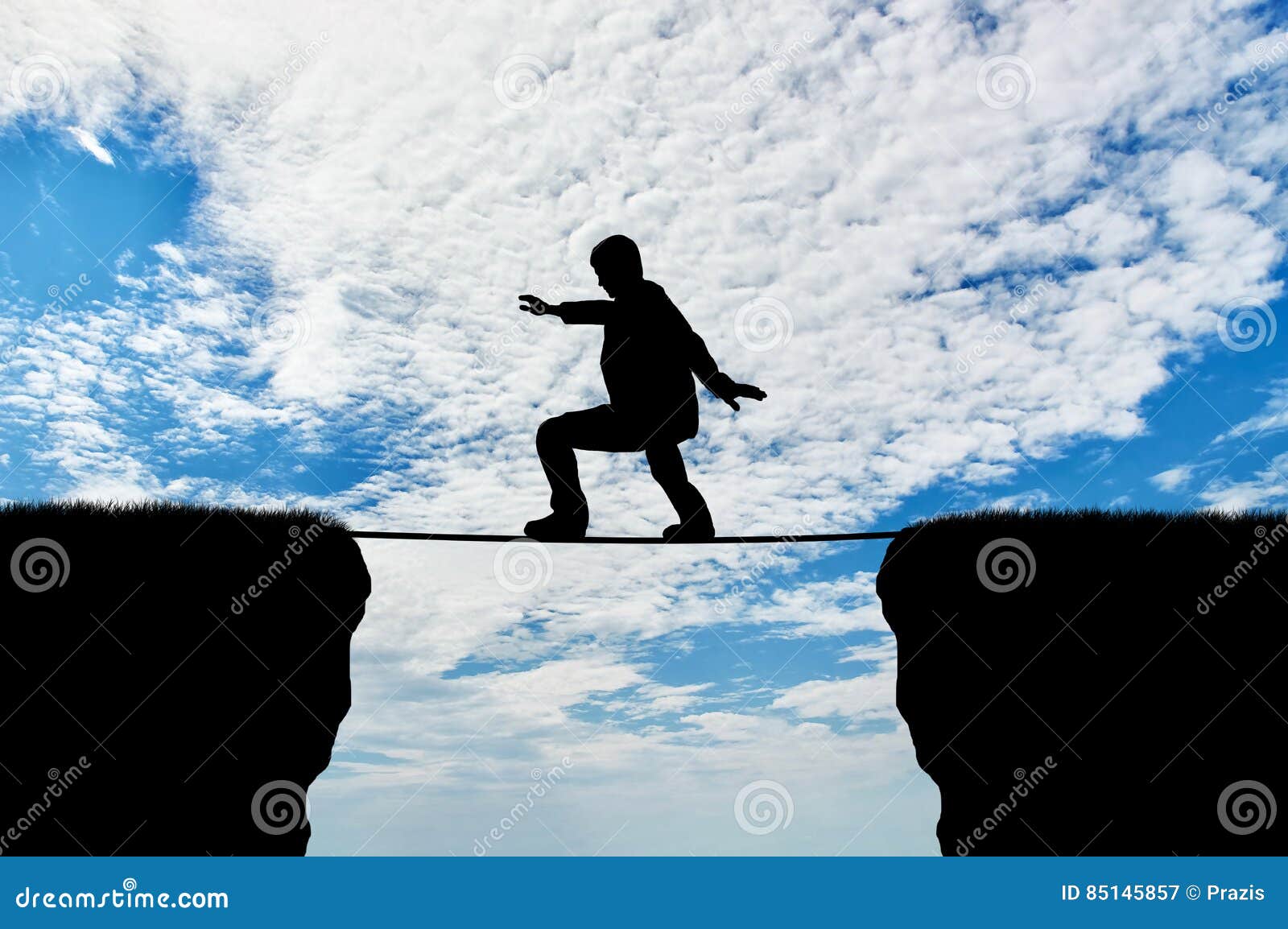 man-walks-tightrope-over-cliff-concept-b