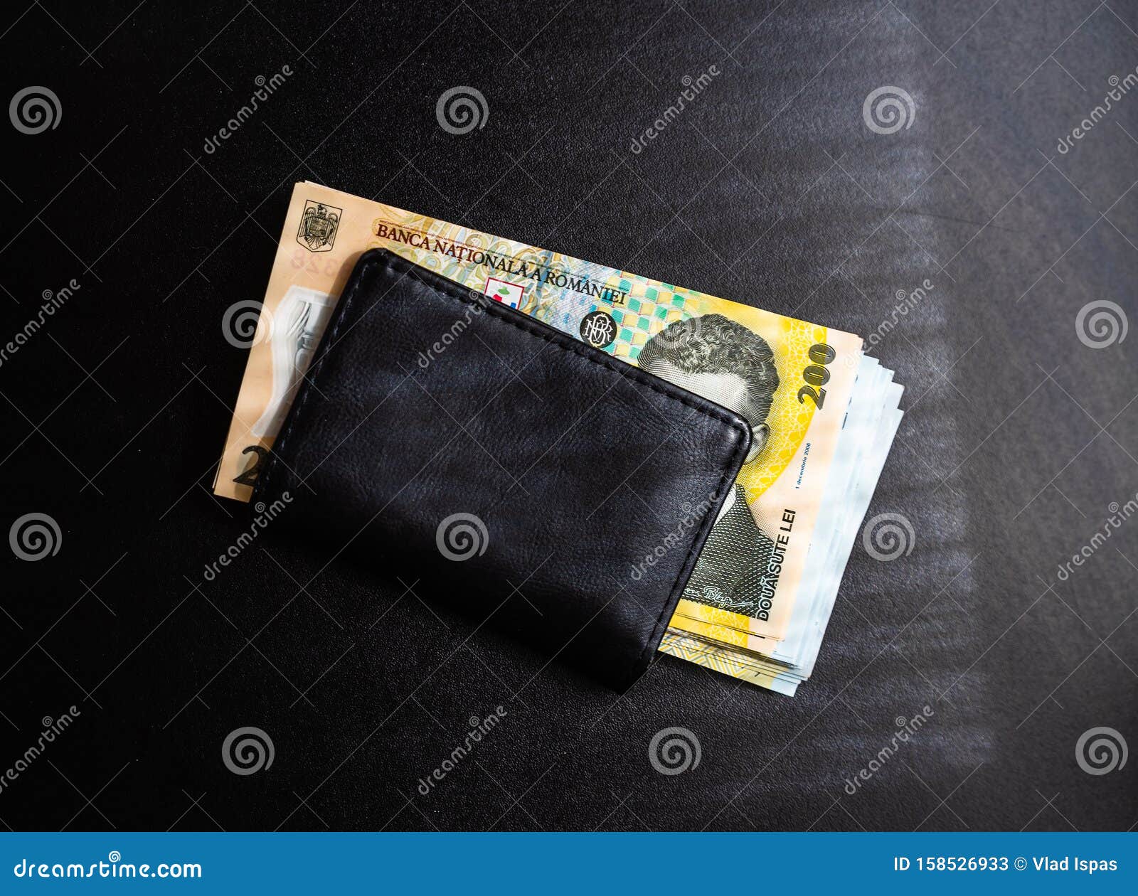 man wallet with money on the table, wallet with lei
