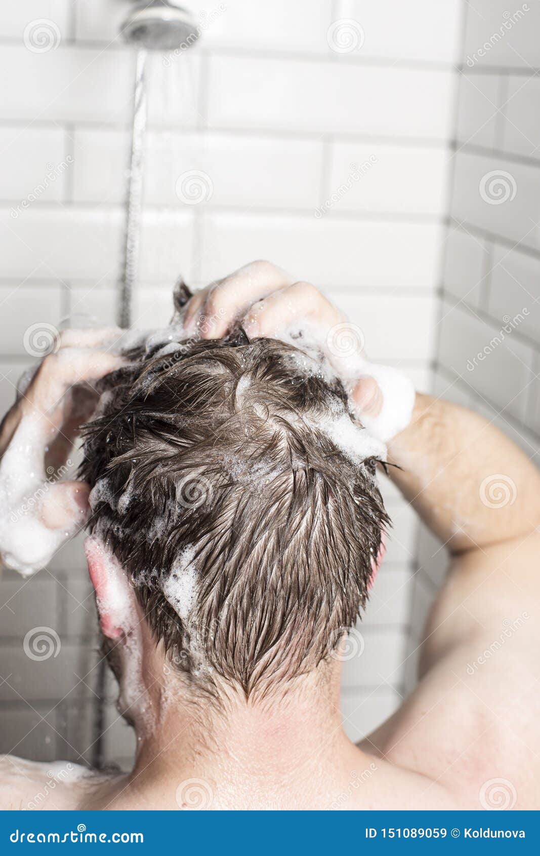 A Man Washes His Hair with Shampoo in the Bathroom, Against the Background of a Shower with Running Water. Back View Stock Image - Image of treatment, water: 151089059 A Man Washes His Hair with Shampoo in the Bathroom, Against the Background of a Shower with Running Water. Back View Stock Image - Image of treatment, water: 151089059
