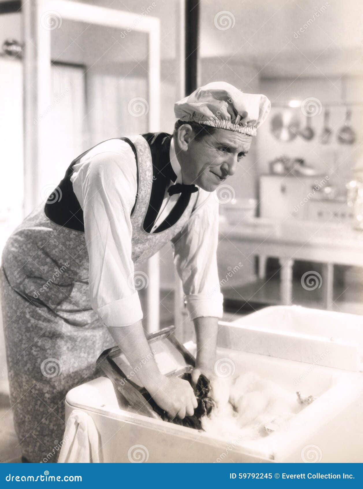 Man Washing Clothes in the Kitchen Sink Stock Image Image of 19101940