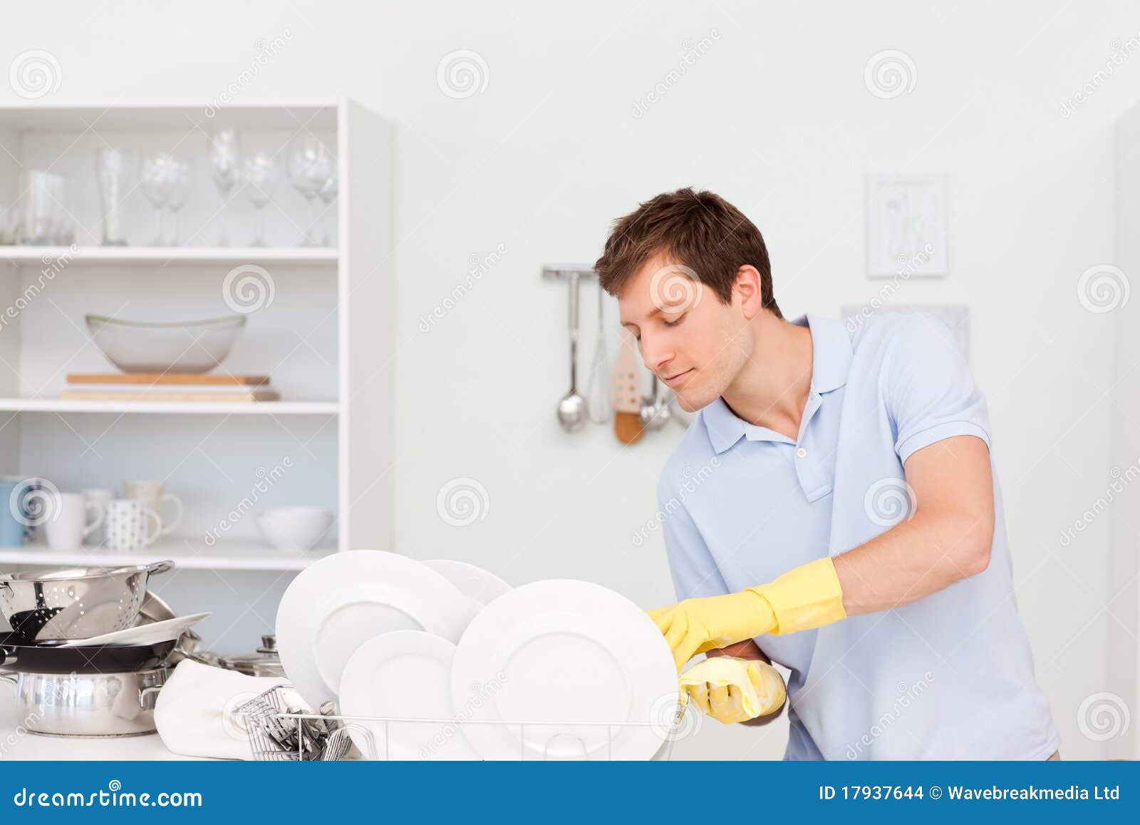 Man washing dishes stock photo. Image of chores, european 17937644