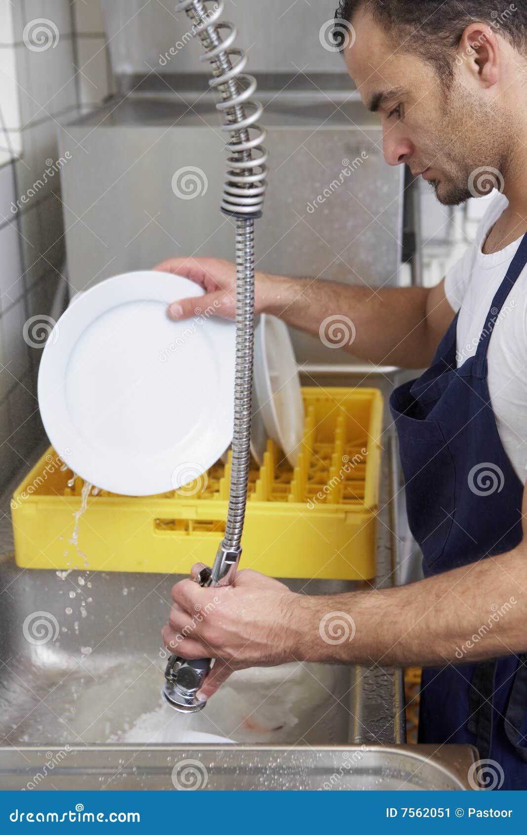 Man washing dishes stock image. Image of tray, restaurant 7562051