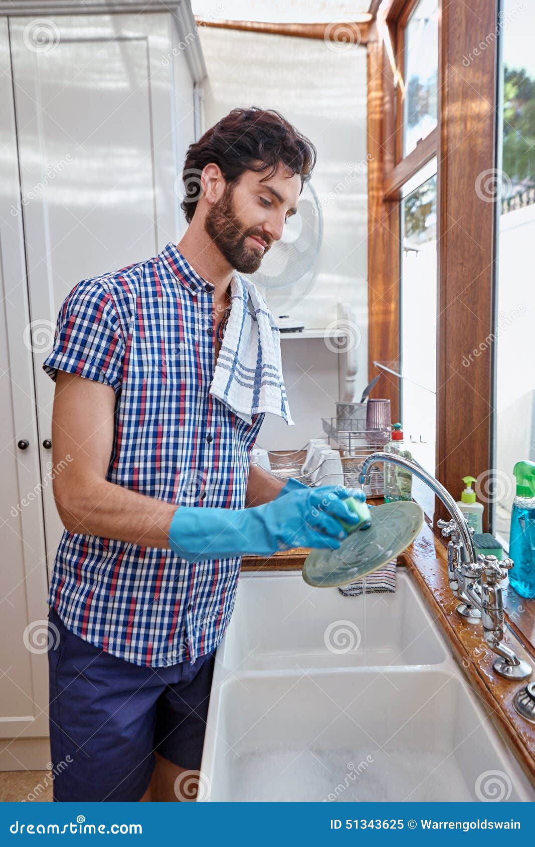 Man washing dishes stock image. Image of household, soap 51343625