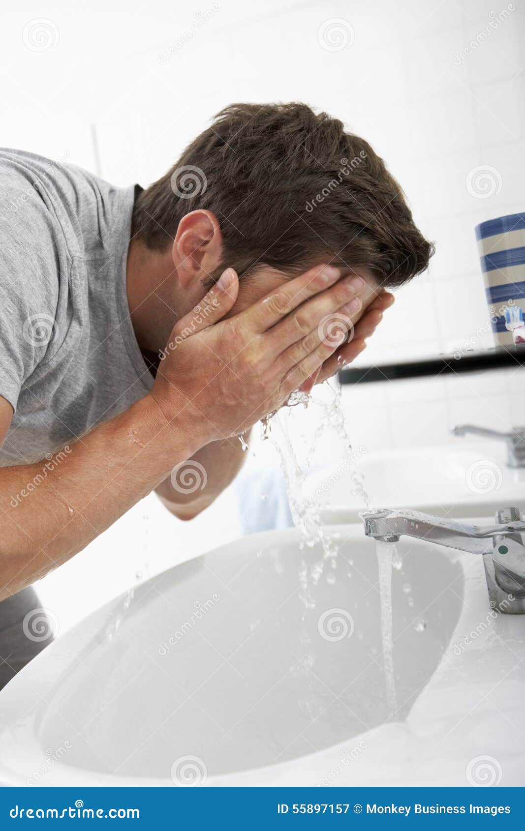 Man Washing Face in Bathroom Sink Stock Image Image of caucasian