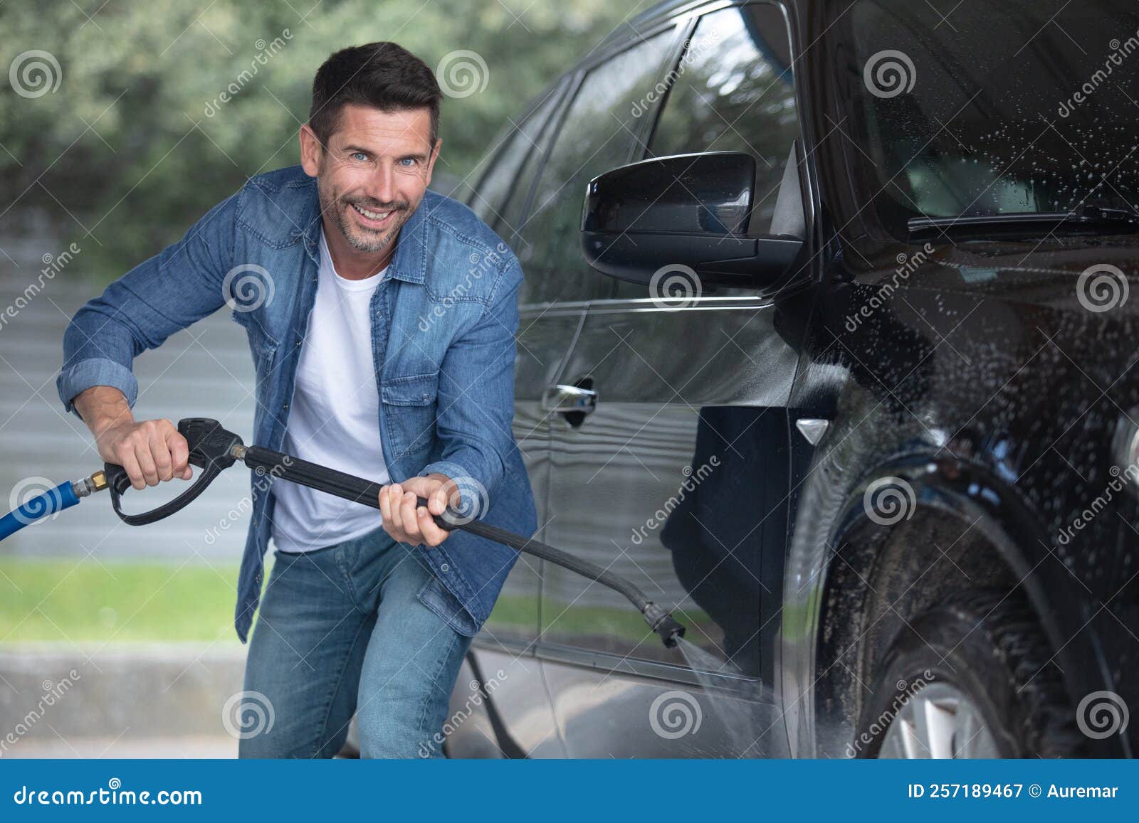 Man Washing Car on Driveway Stock Image Image of automobile, front