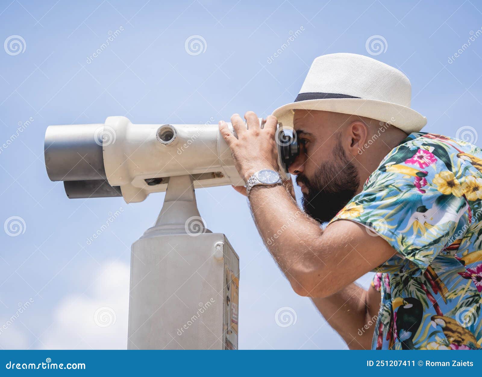 Man Watching through Binoculars Telescope Standing on Observation Point