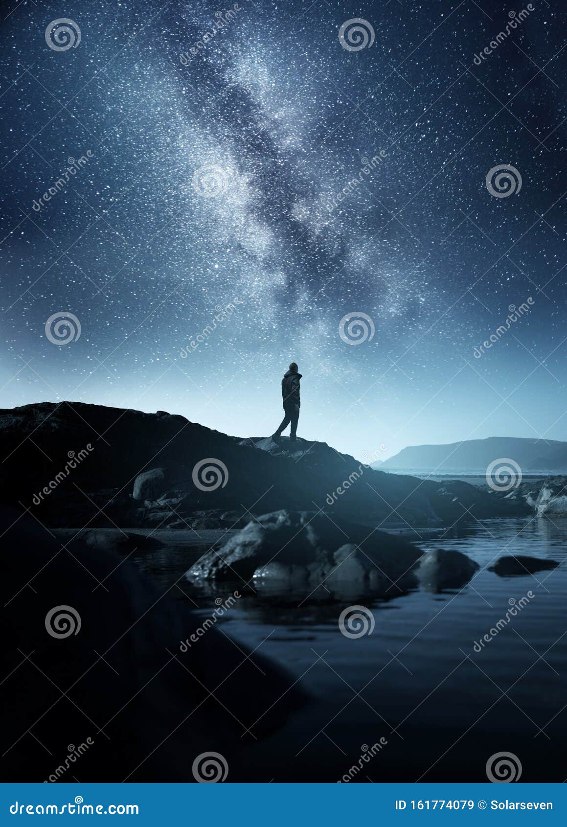 a man watching the night sky