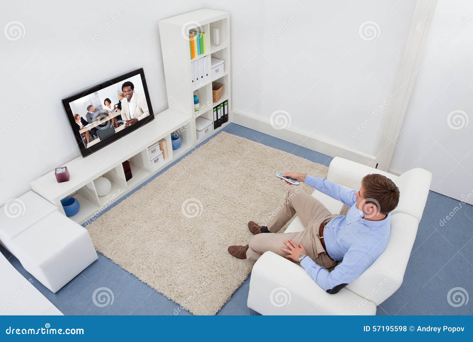 Man Watching Television stock photo. Image of changing 57195598