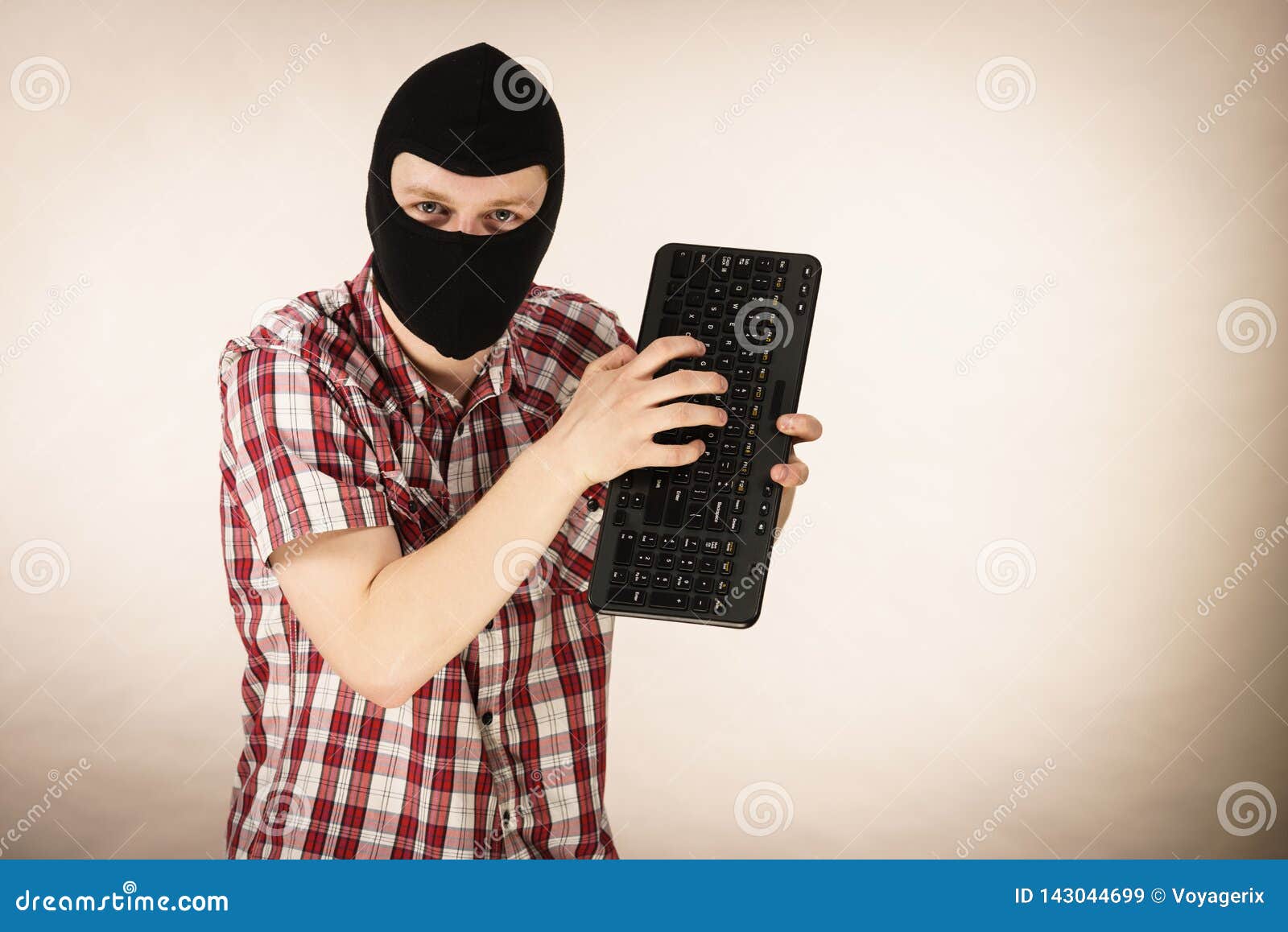 Man Wearing Balaclava Holding Keyboard Stock Image Image of