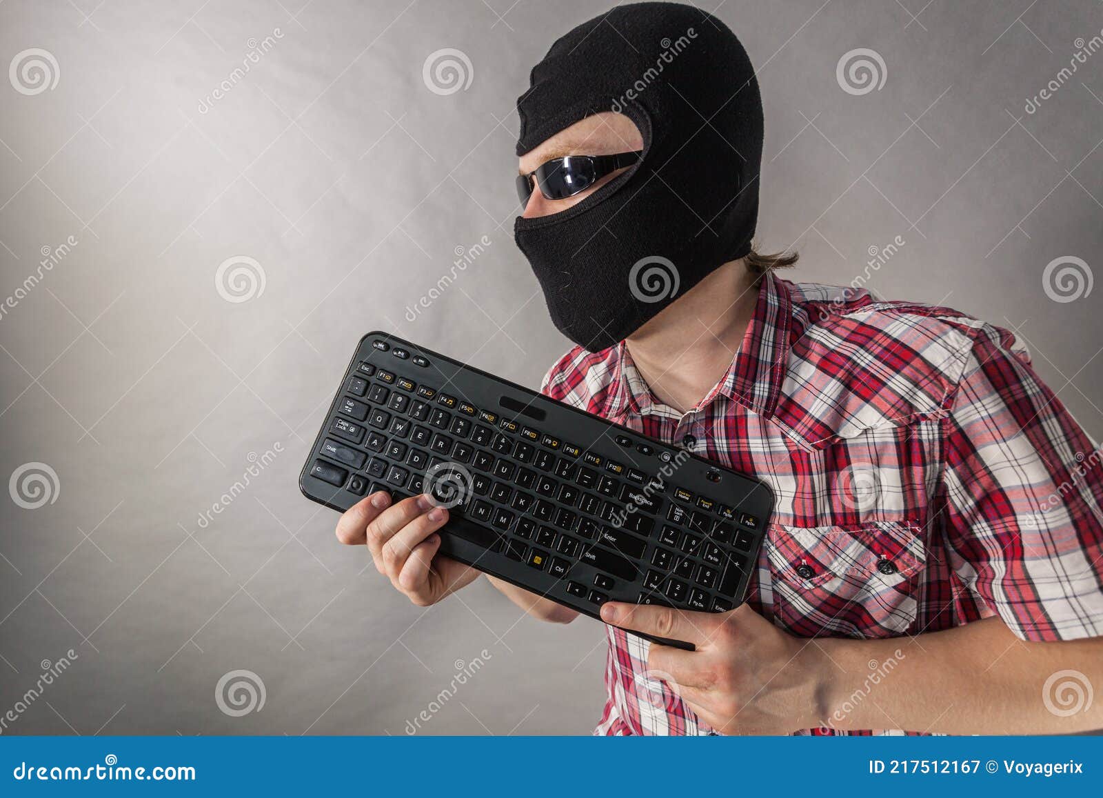 Man Wearing Balaclava Shooting from Keyboard Stock Image Image of