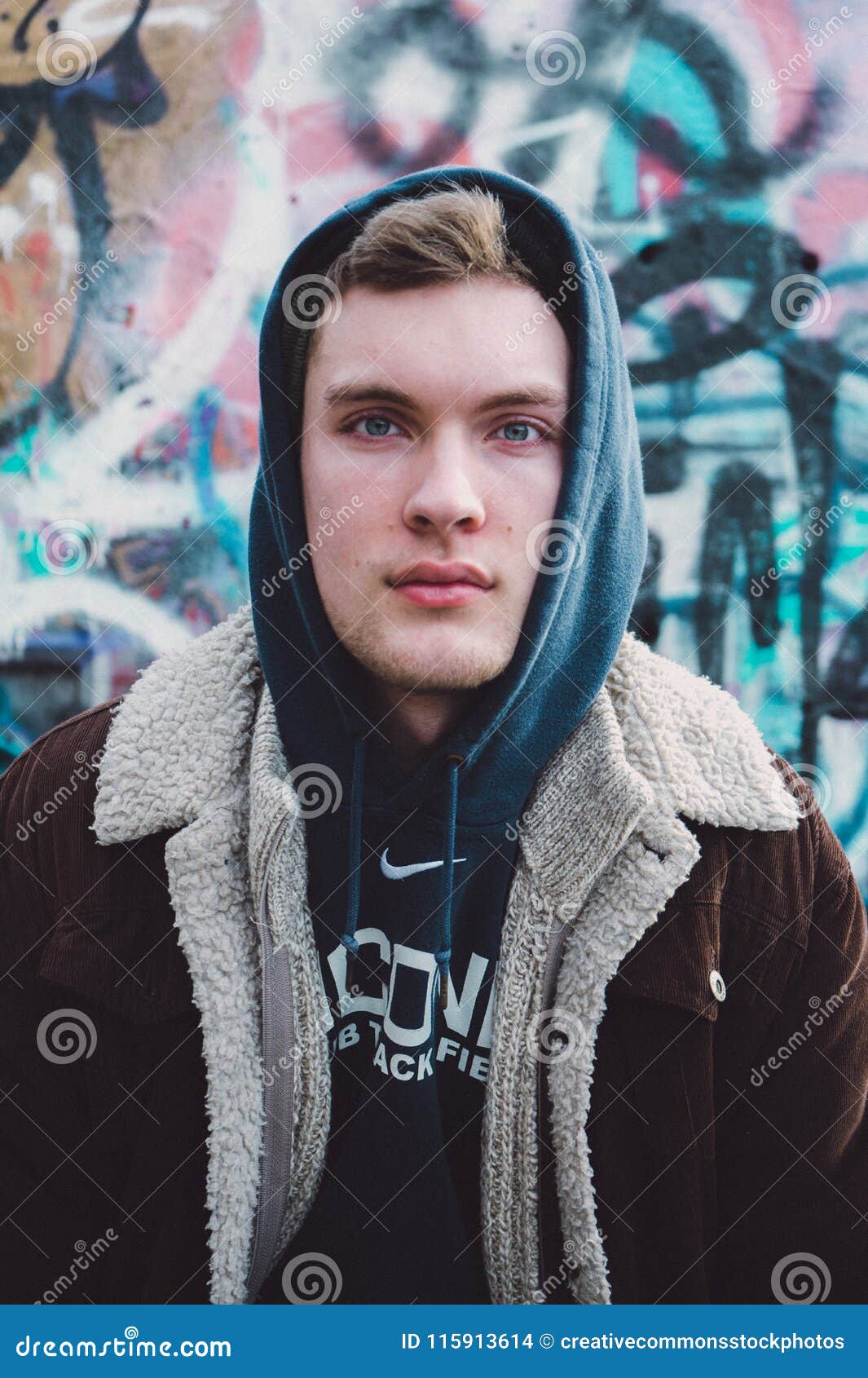 Man Wearing Blue Nike Pullover Hoodie Picture. Image 115913614