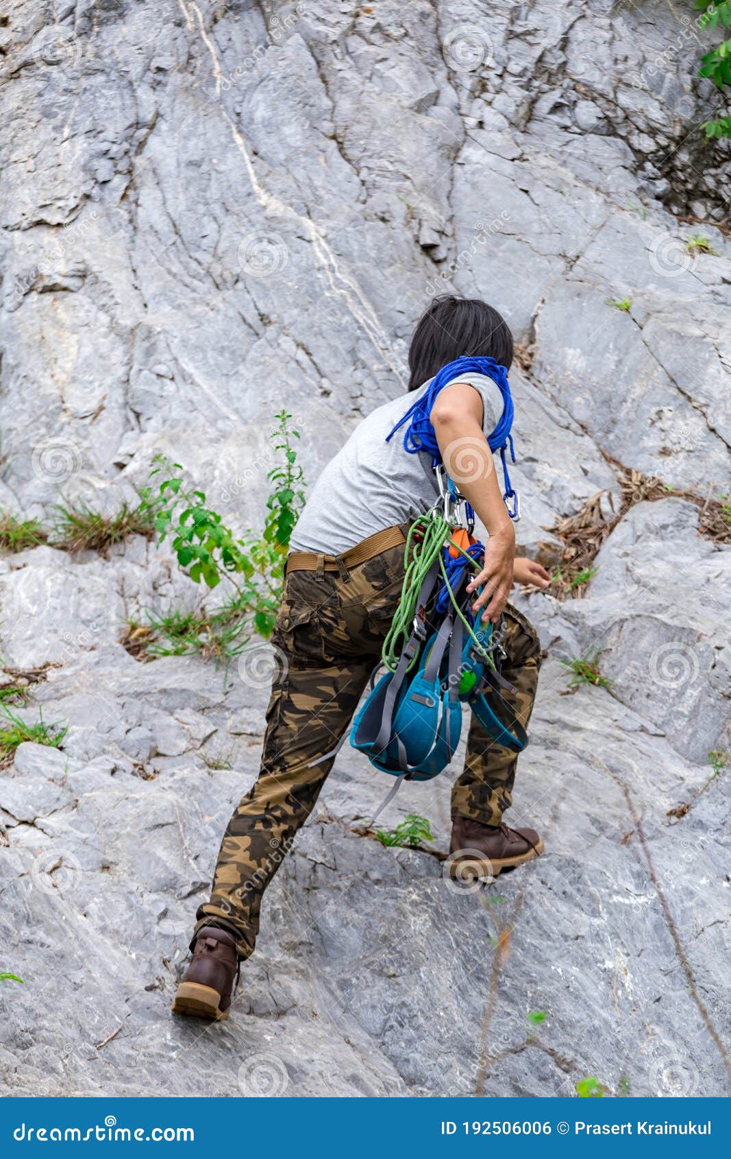 Man Wearing Cargo Pants and Climbing on the Rock Stock Photo Image of