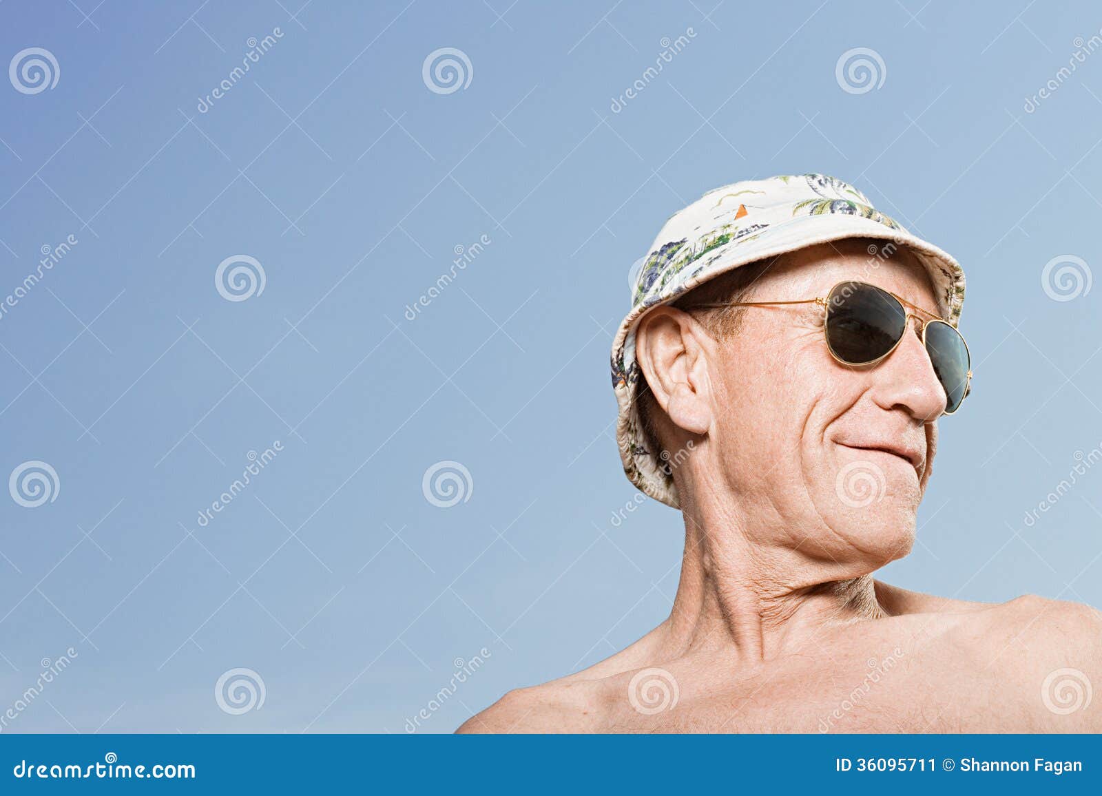 man wearing sunhat and sunglasses