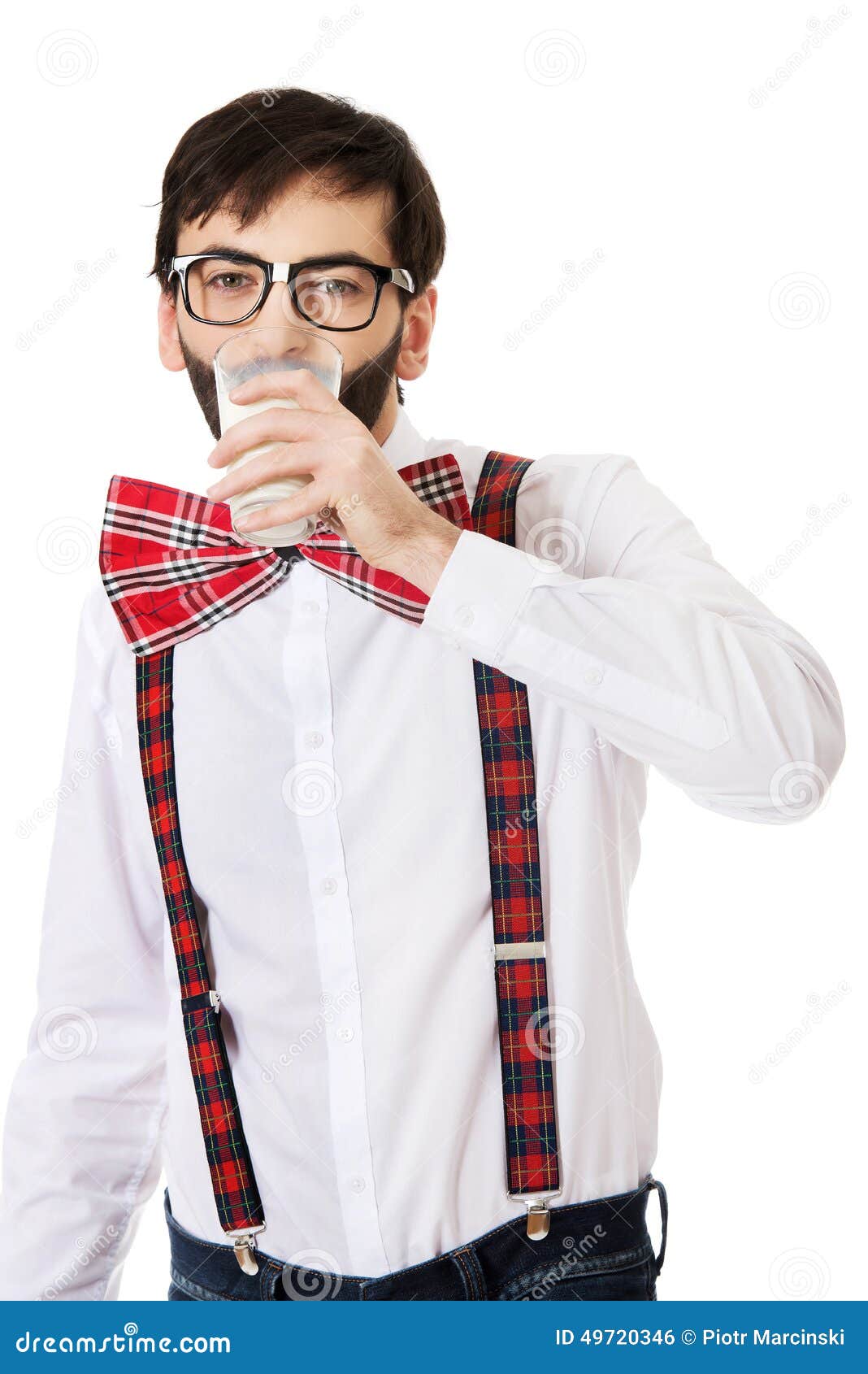 Man Wearing Suspenders Drinking Milk. Stock Photo Image of macho