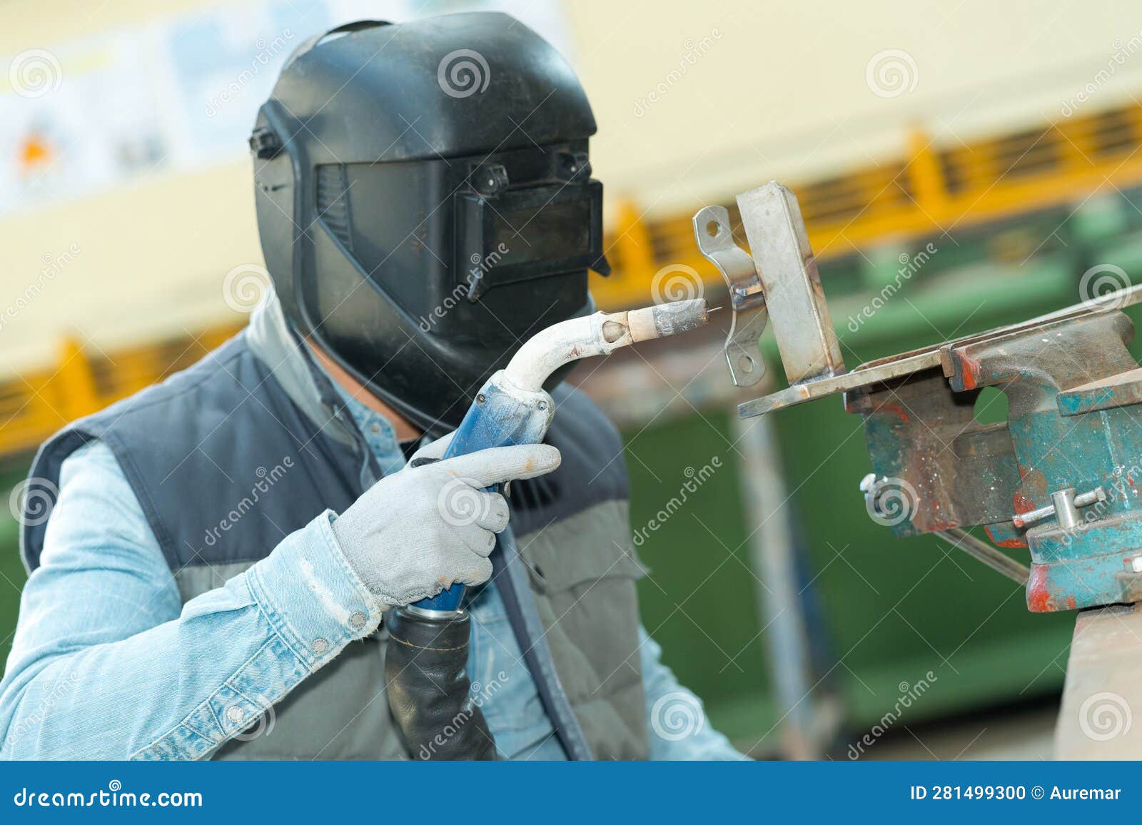 Man Welding Metal Held in Vise Stock Photo Image of industry