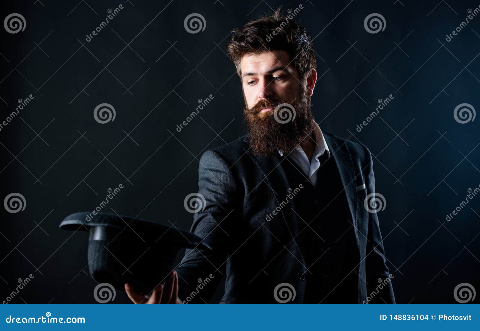 Foto de Elegant and stylish hipster. Retro fashion hat. Man with hat.  Vintage fashion. Man well groomed bearded gentleman on dark background.  Male fashion and menswear. Formal suit classic style outfit do