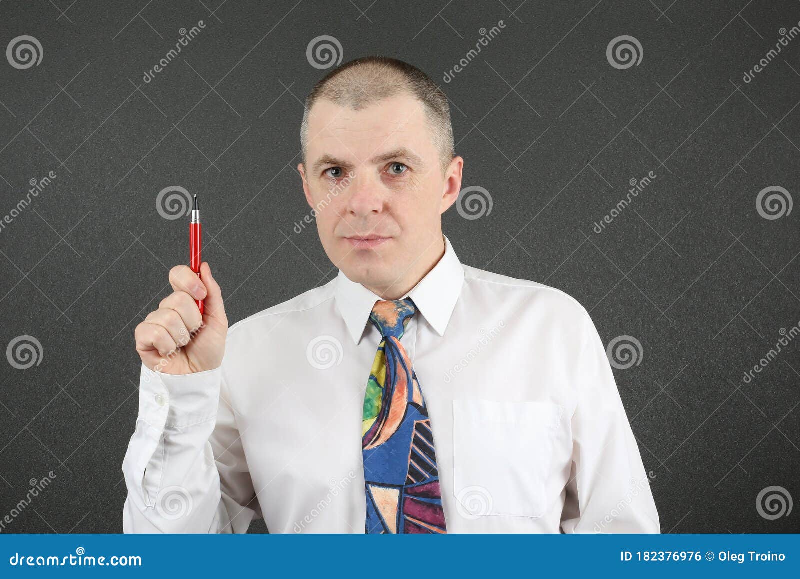 The Man in the White Shirt Points Up the Red Pen Stock Photo Image of