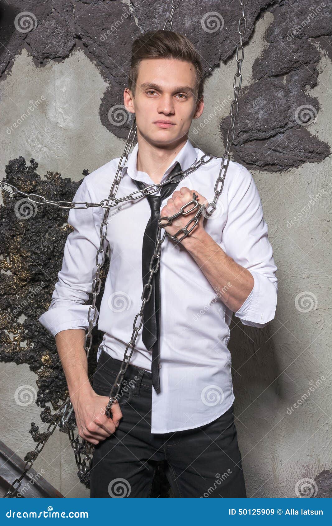 A Man in a White Shirt and Tie Breaks the Chain. Stock Image Image of