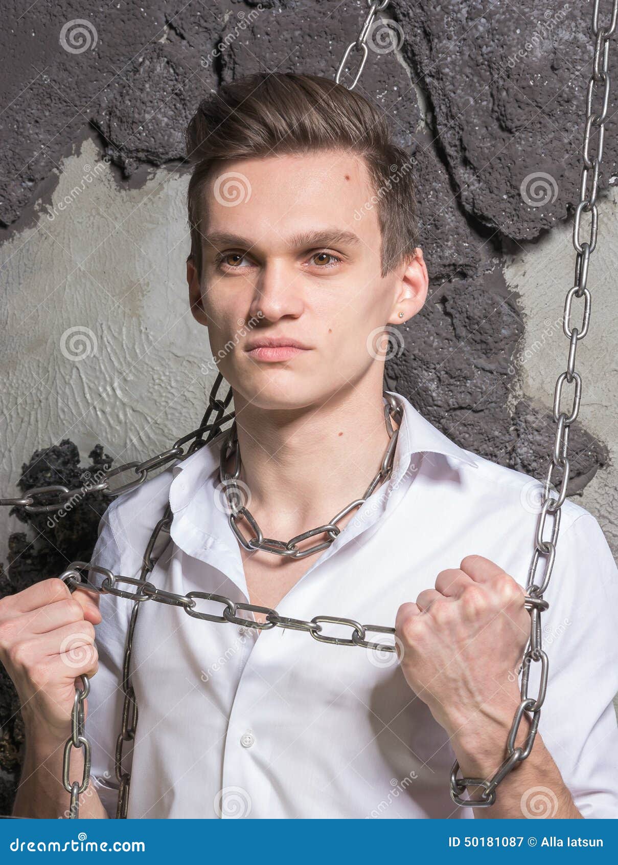 A Man in a White Shirt and Tie Breaks the Chain. Stock Image Image of