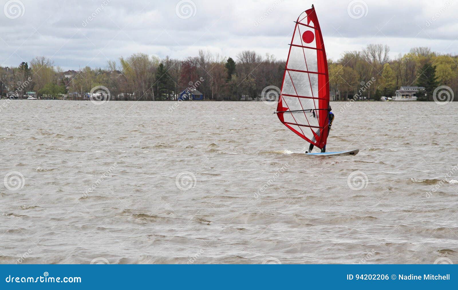 Man windsurfing on a board editorial photo. Image of leisure 94202206