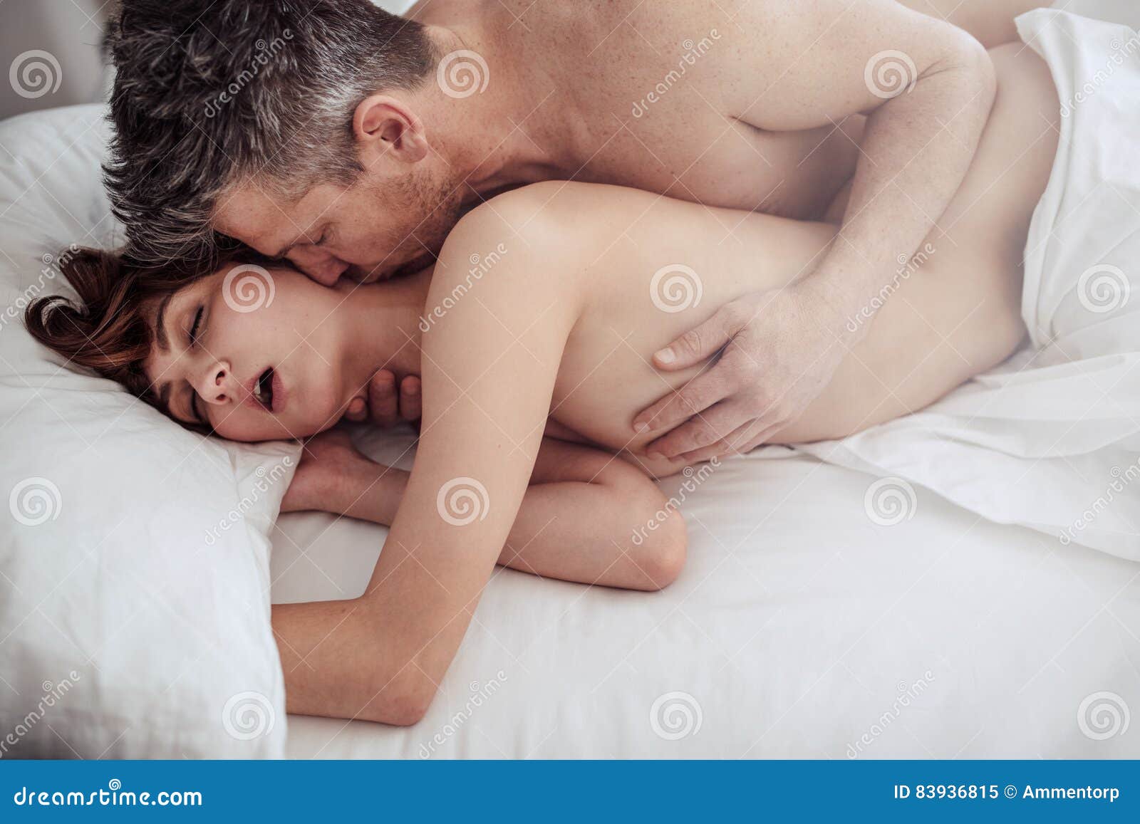 Man and Woman in Bed Having Intimate Sex Stock Image image