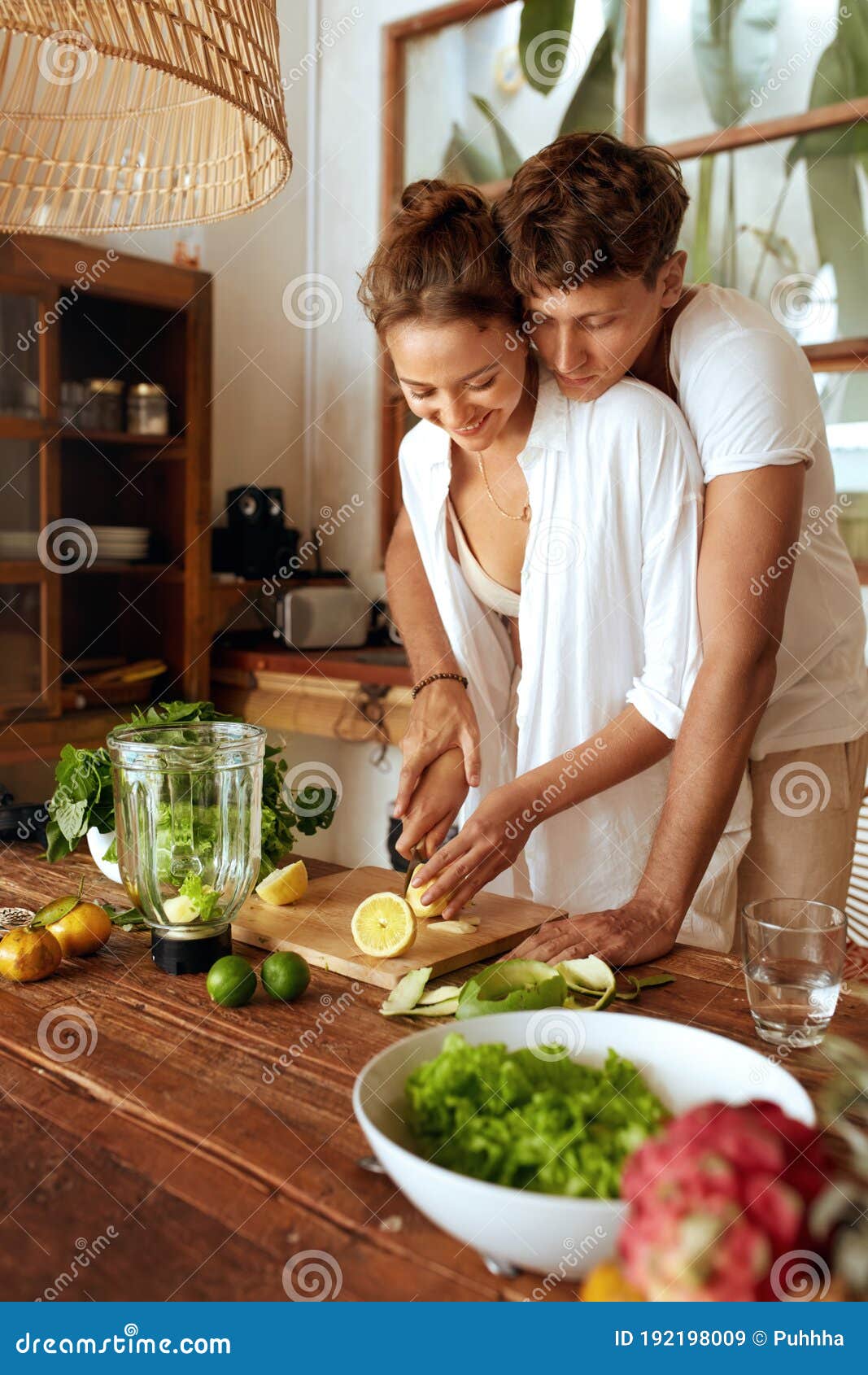Man and Woman Cooking Together at Kitchen. Romantic Couple Cutting ...