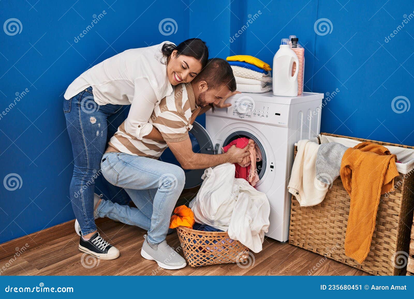 Man And Woman Couple Hugging Each Other Washing Clothes At Laundry Room Stock Image Image Of