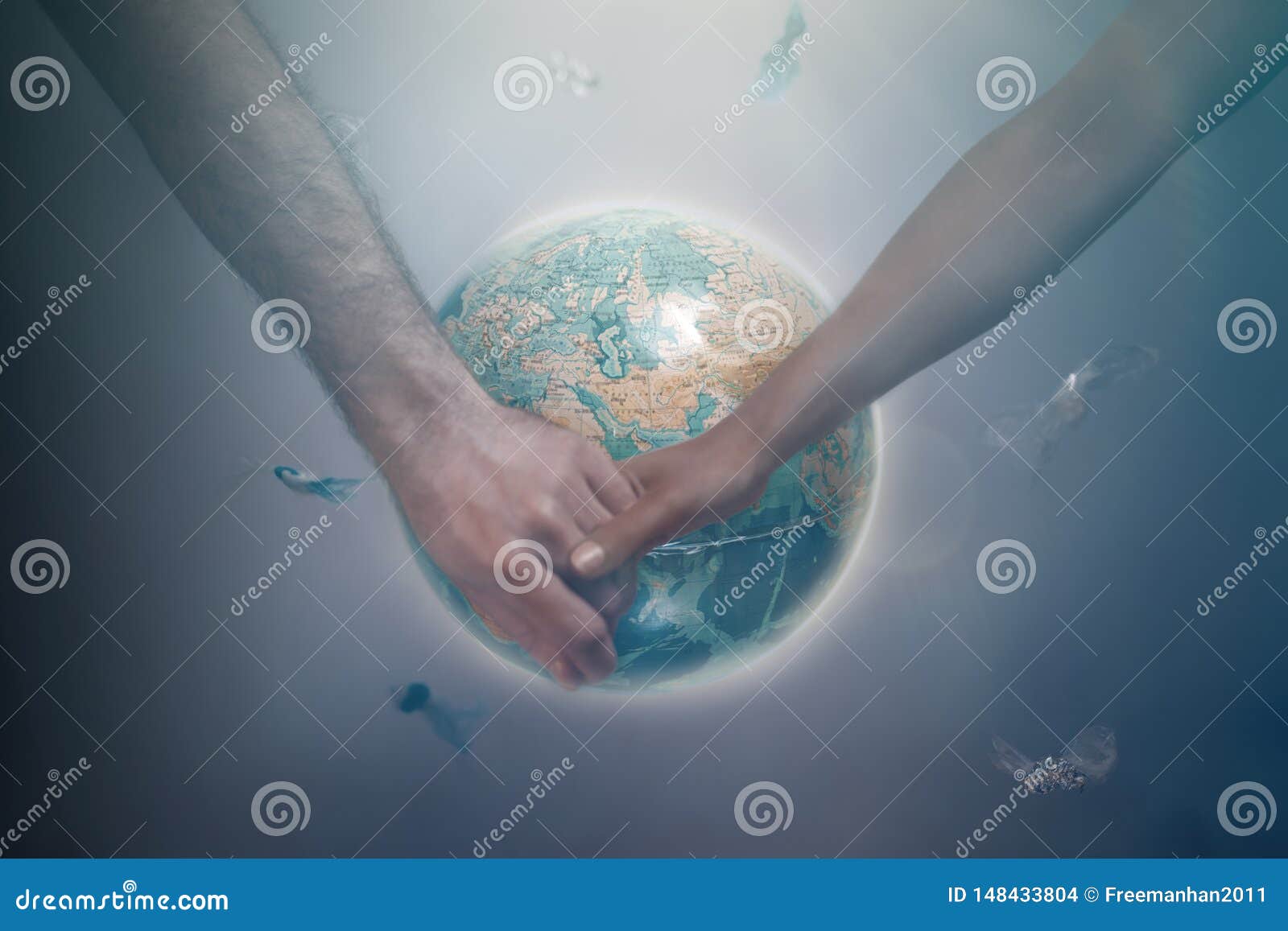 A Man And A Woman Of Different Races Holding Hands On The