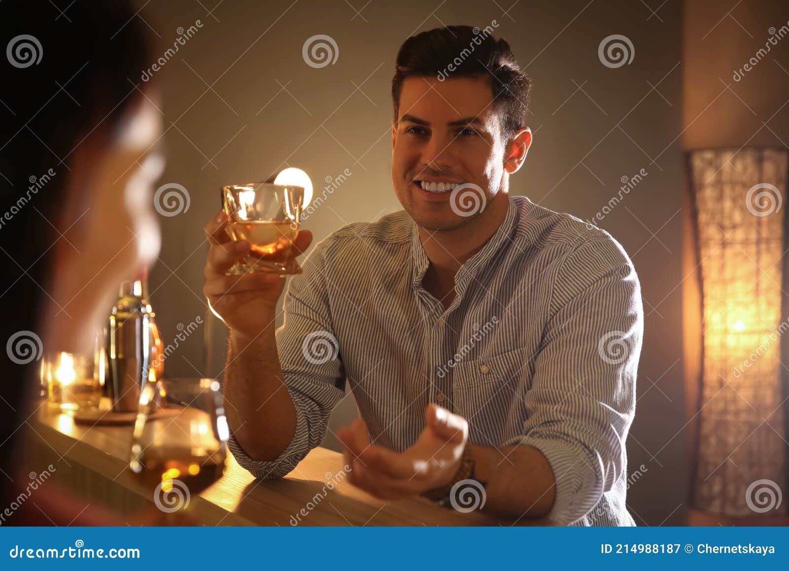 man and woman flirting with each other in bar