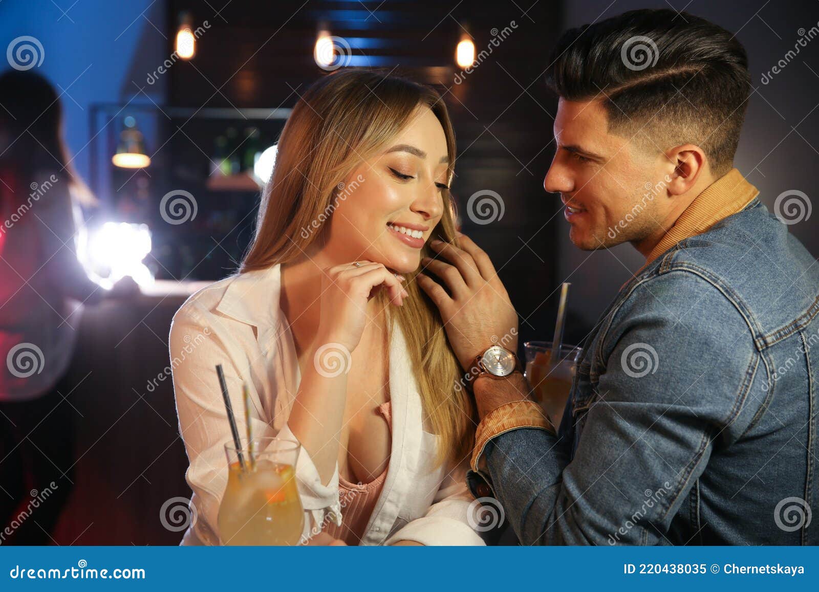 man and woman flirting with each other