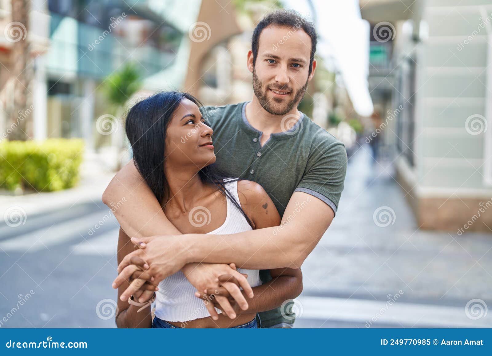 Man And Woman Interracial Couple Hugging Each Other At Street Stock 