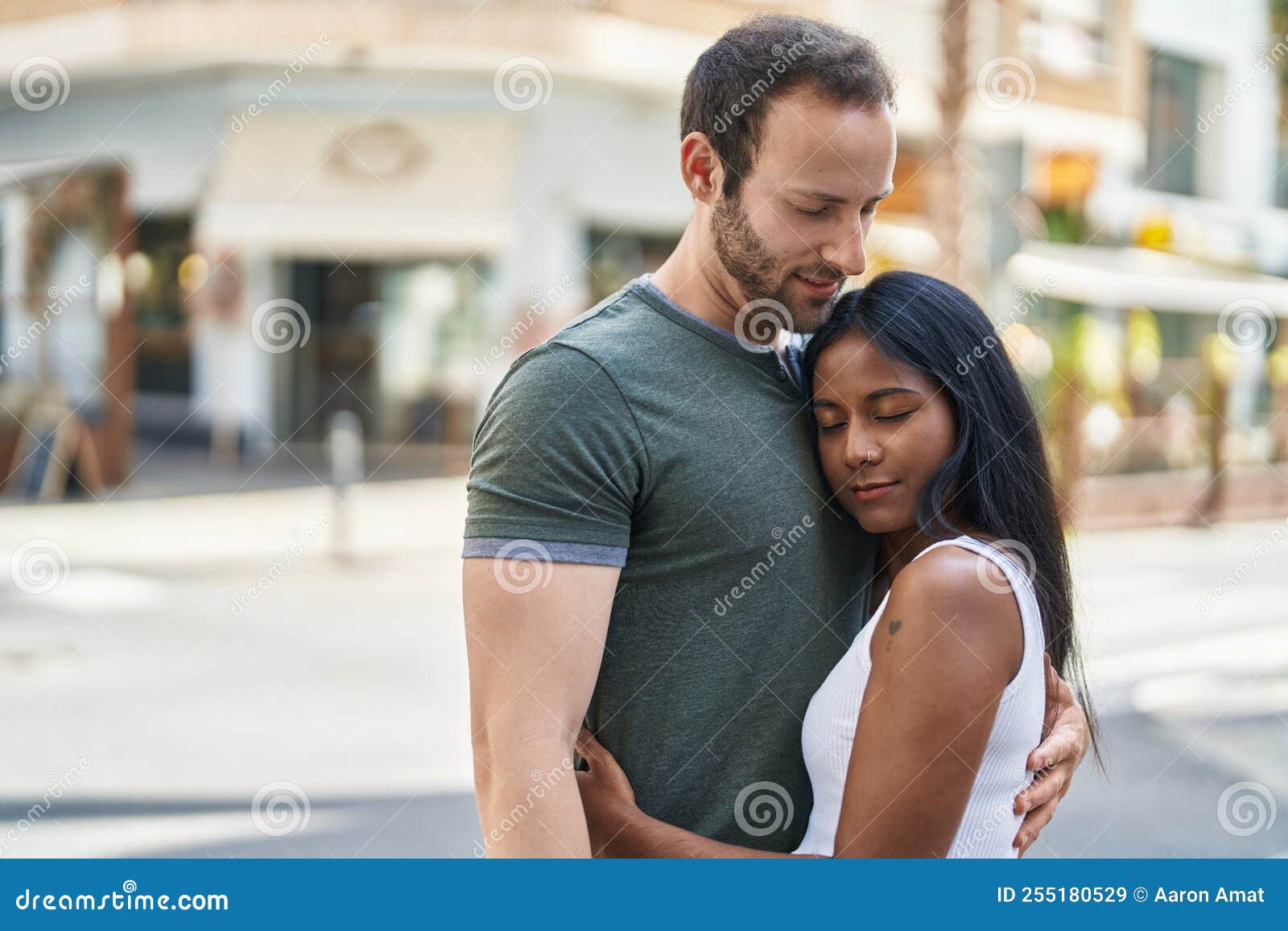 Man And Woman Interracial Couple Hugging Each Other At Street Stock 