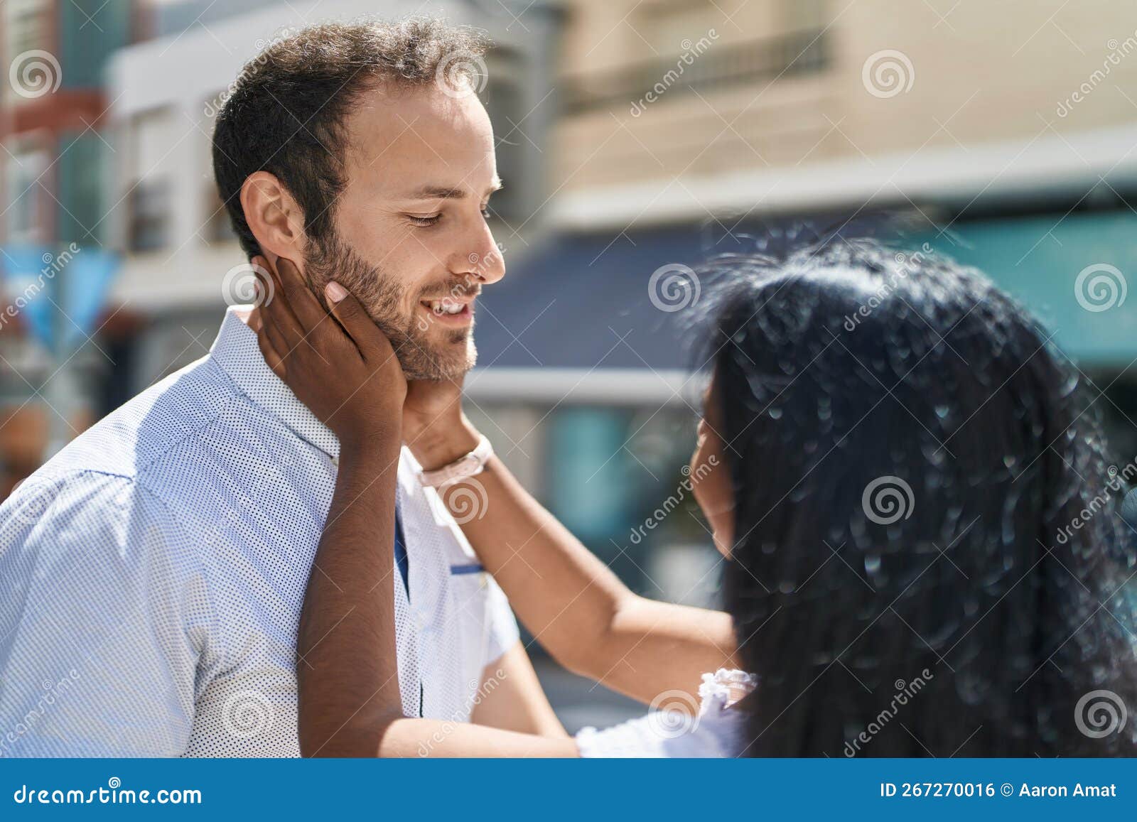 Man And Woman Interracial Couple Hugging Each Other At Street Stock