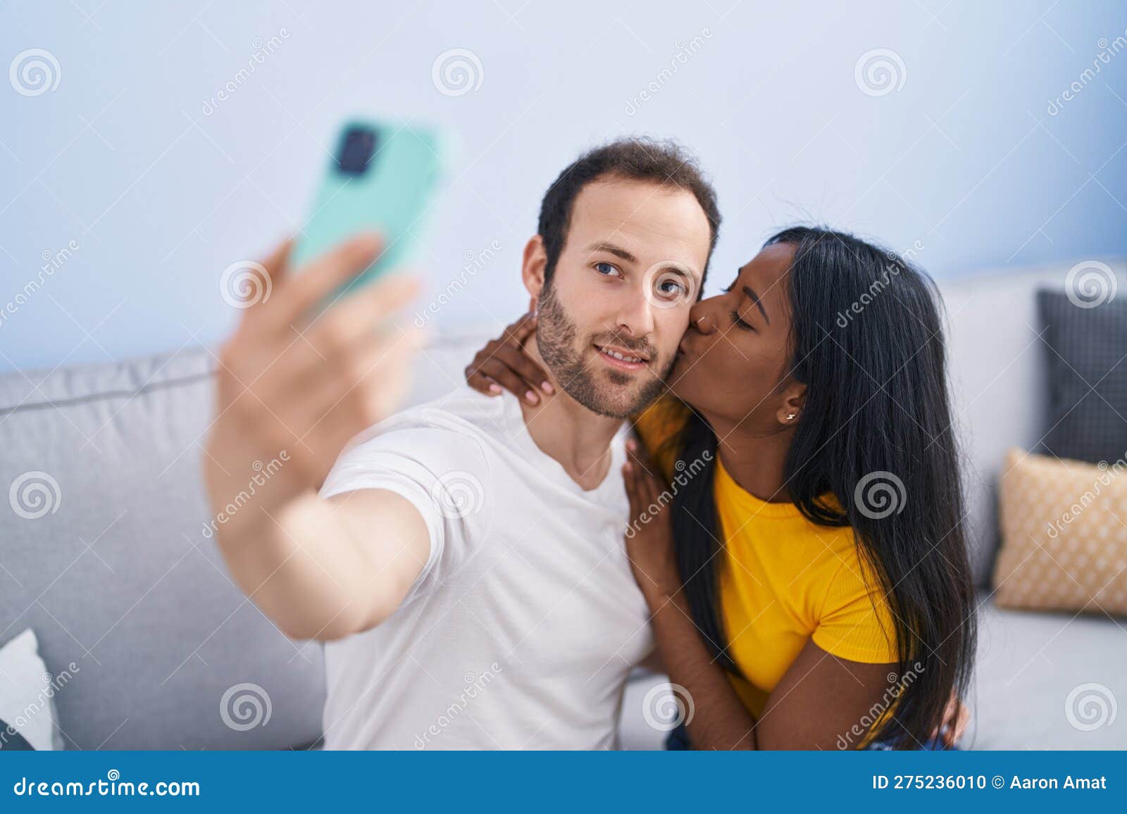 Man And Woman Interracial Couple Making Selfie By Smartphone At Home