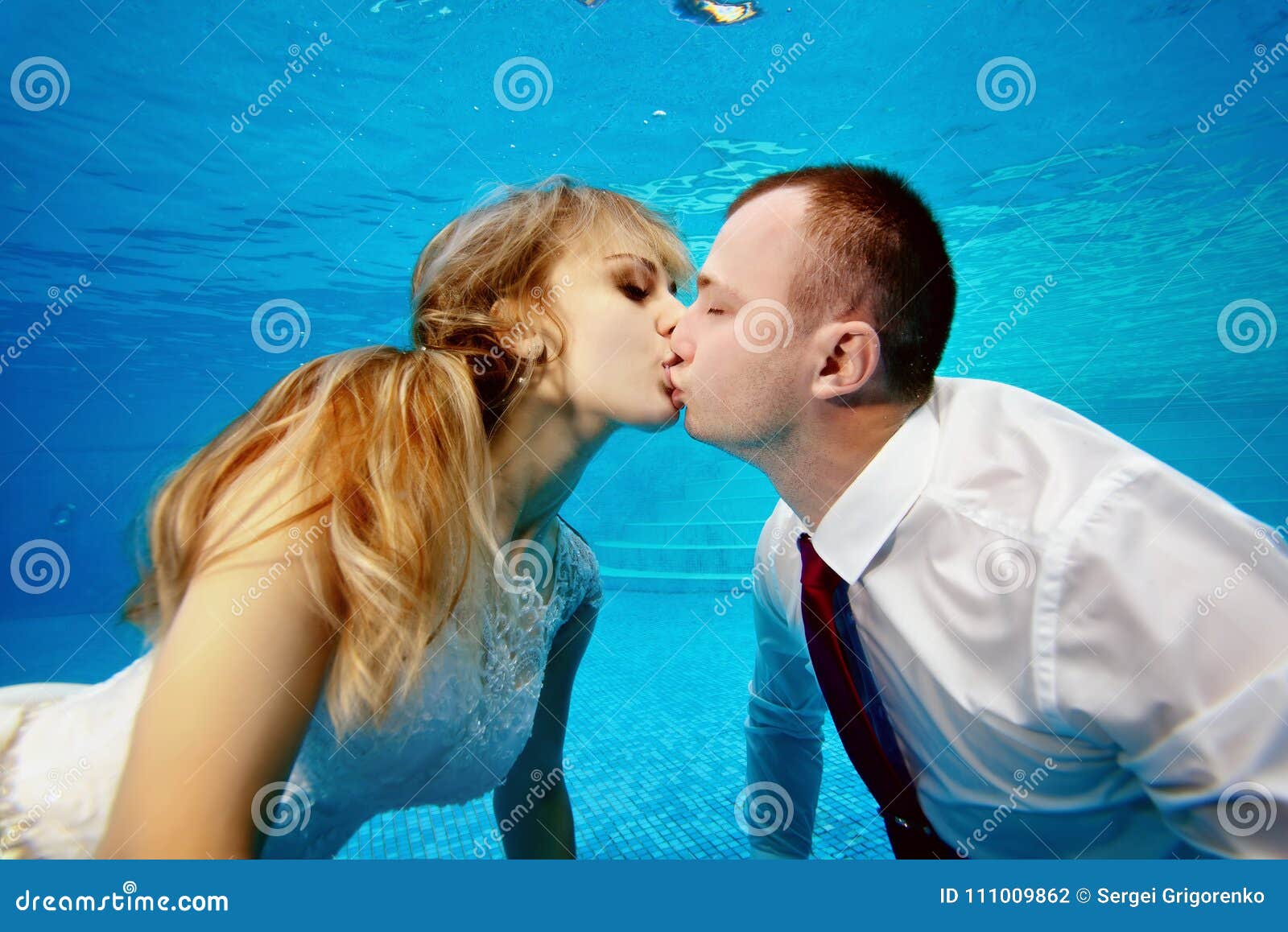 Girls Kissing In The Pool