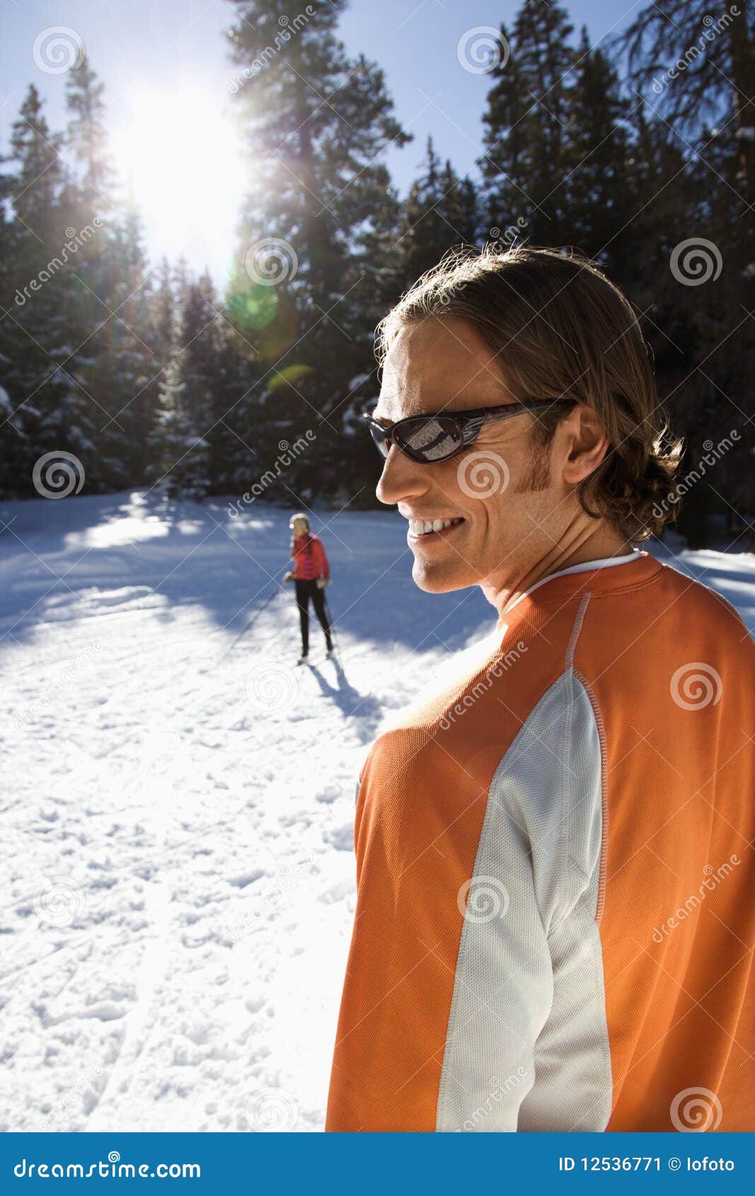 Man and Woman Snow Skiing stock image. Image of adult 12536771