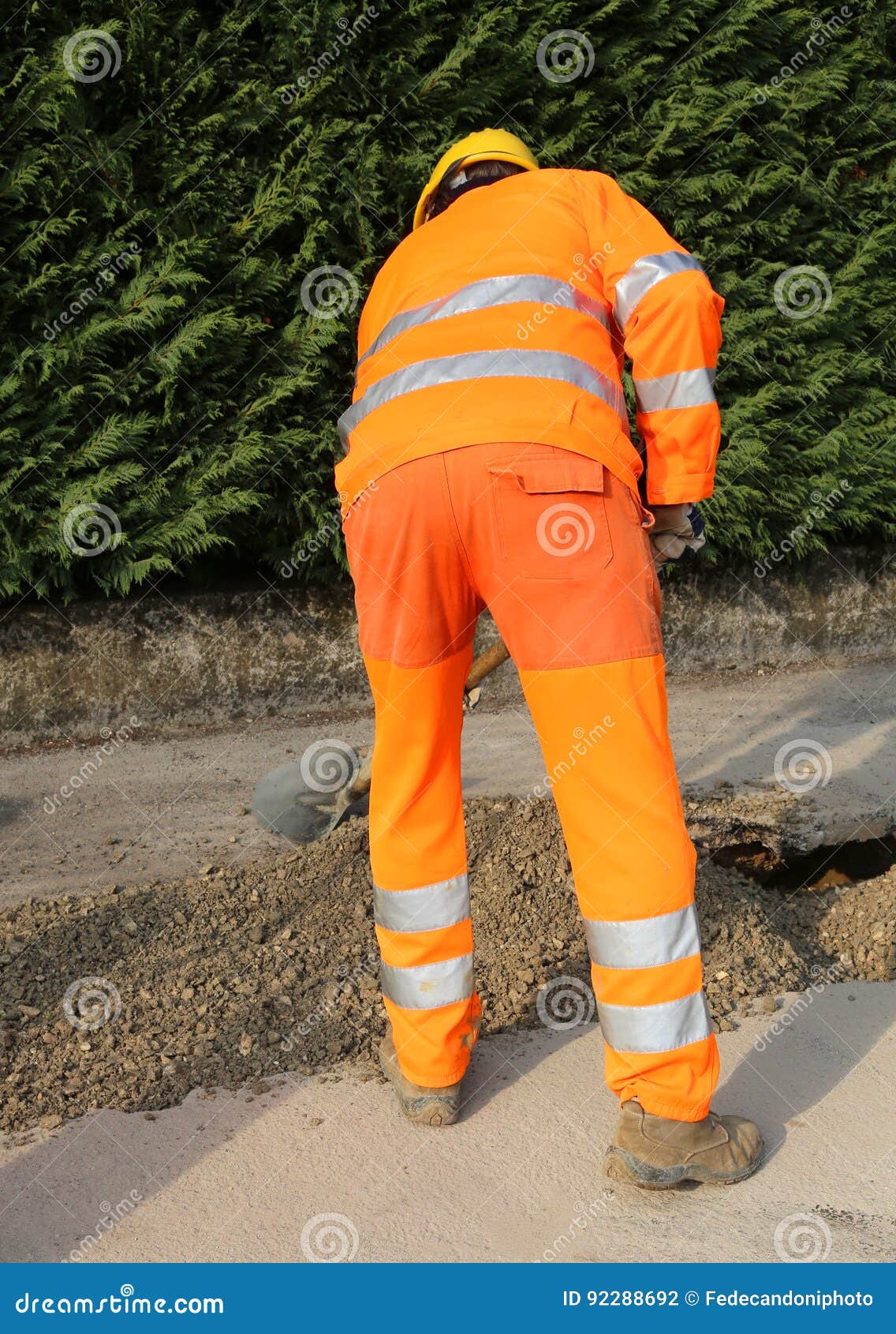 Man at Work with High Visibility Clothing in the Construction Si Stock