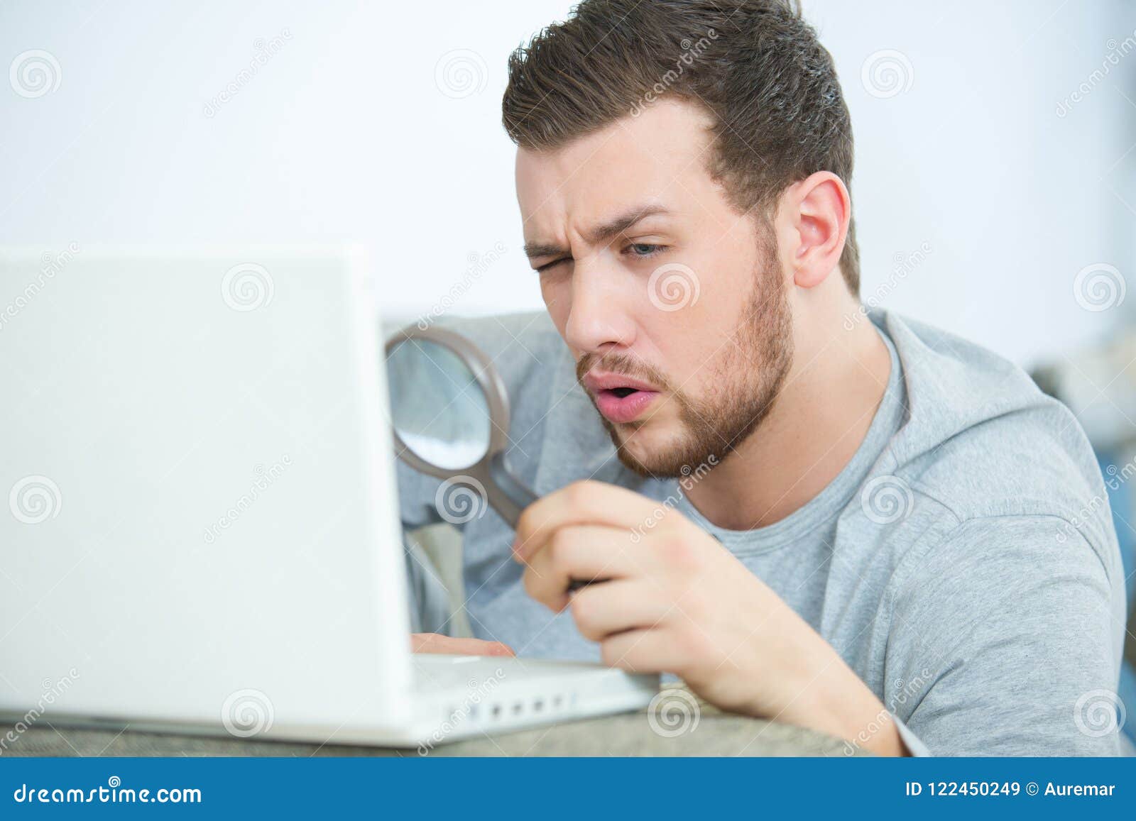 Man Work on Laptop with Magnifying Glass Stock Image Image of