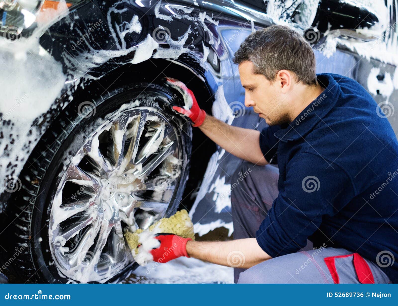 man worker on a car wash