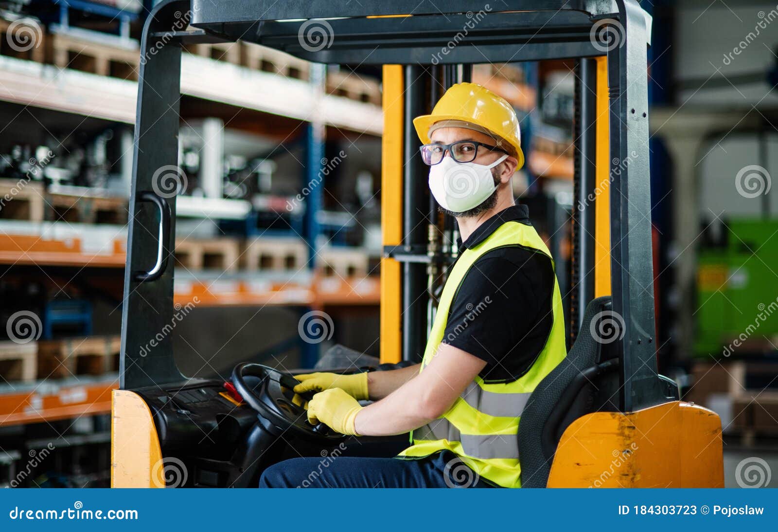 Man Worker Forklift Driver With Protective Mask Working In Industrial Factory Or Warehouse Stock Image Image Of Face Mature 184303723