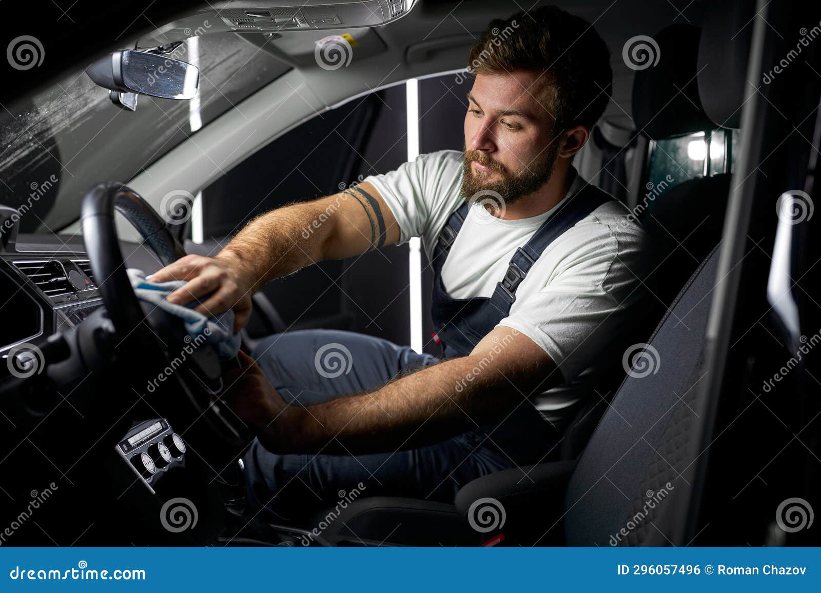 Man Worker Using Cloth Cleaning Car on Dashboard,Cleansing Car Interior