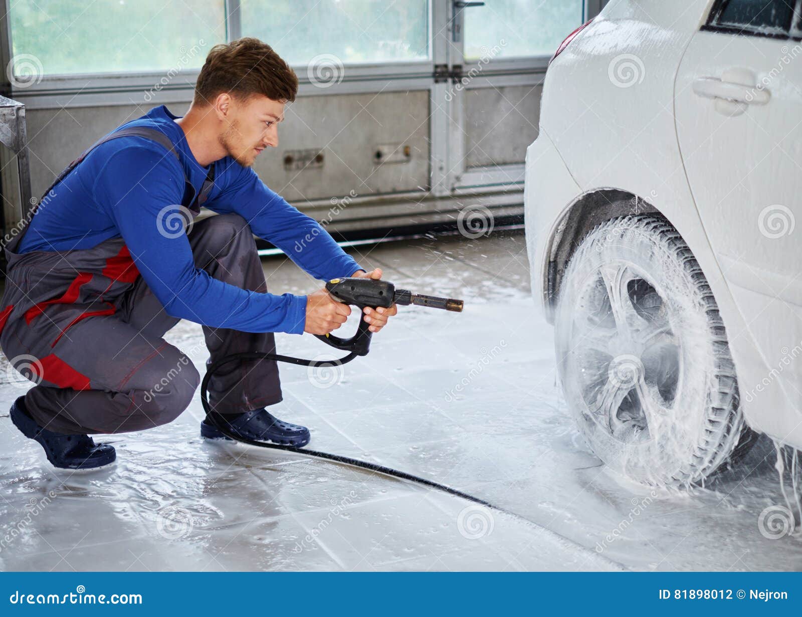 Man Worker Washing Luxury Car on a Car Wash Stock Photo Image of