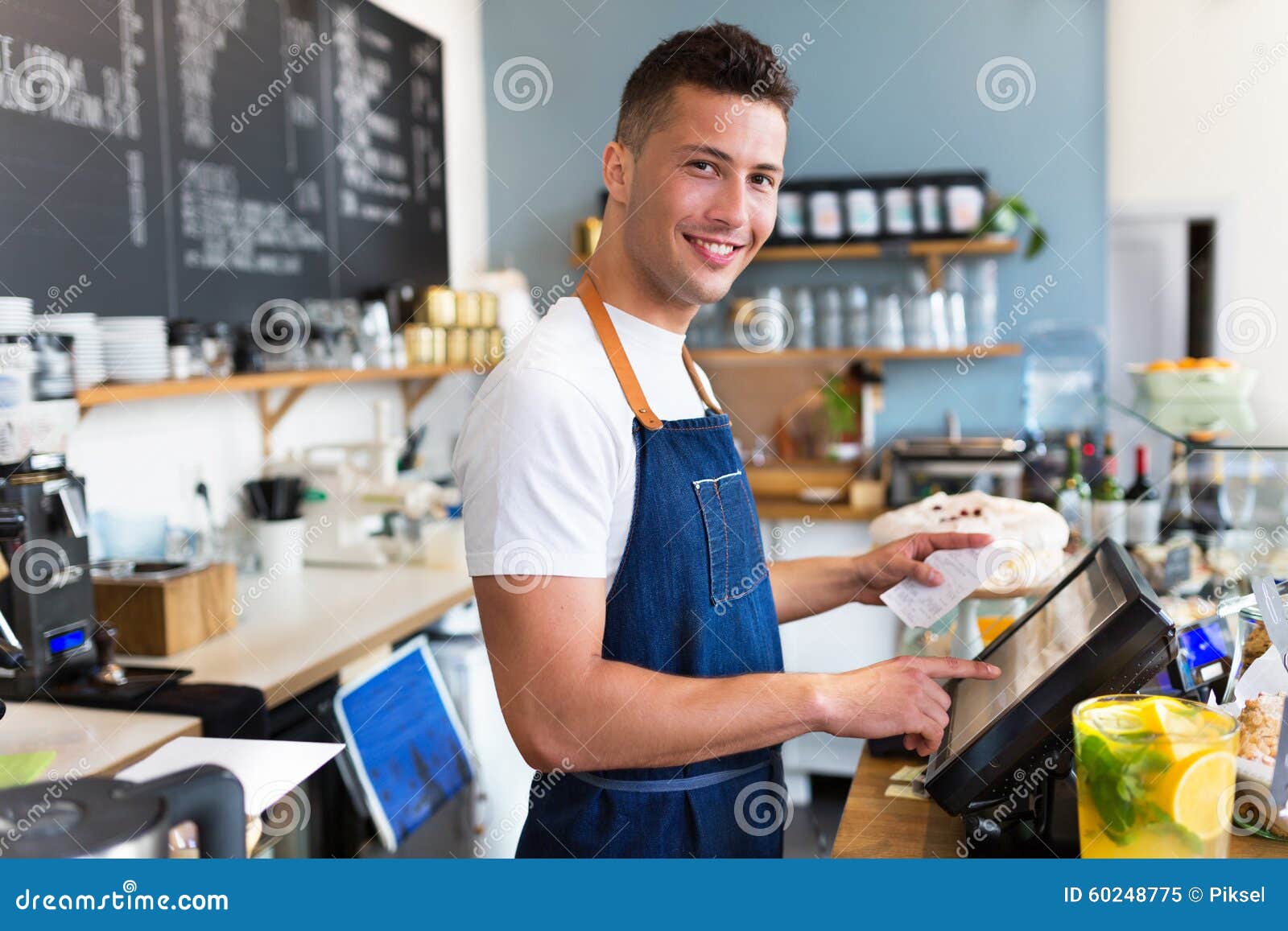 man working in coffee shop